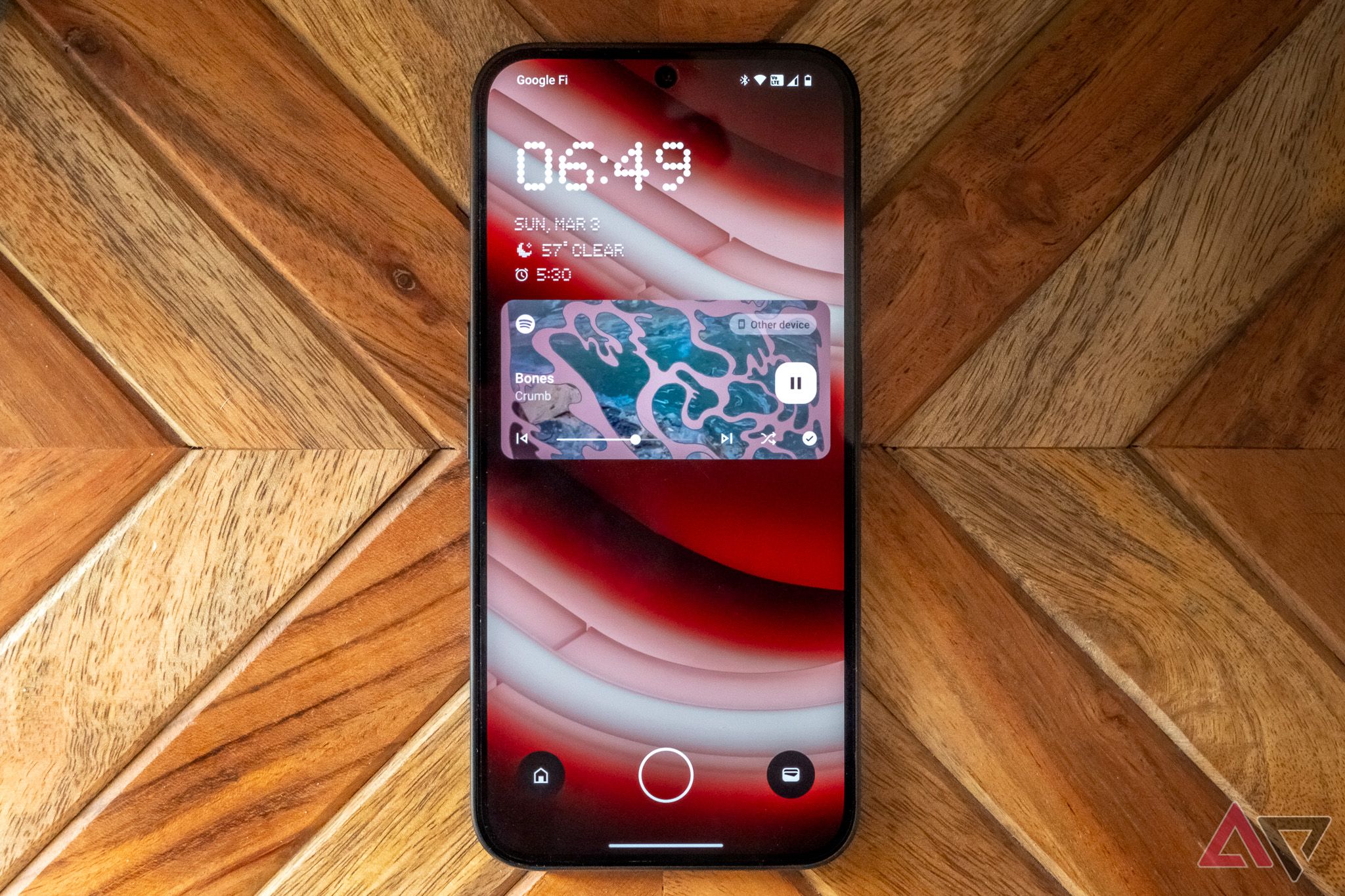 The Nothing Phone 2a's lock screen with Spotify running