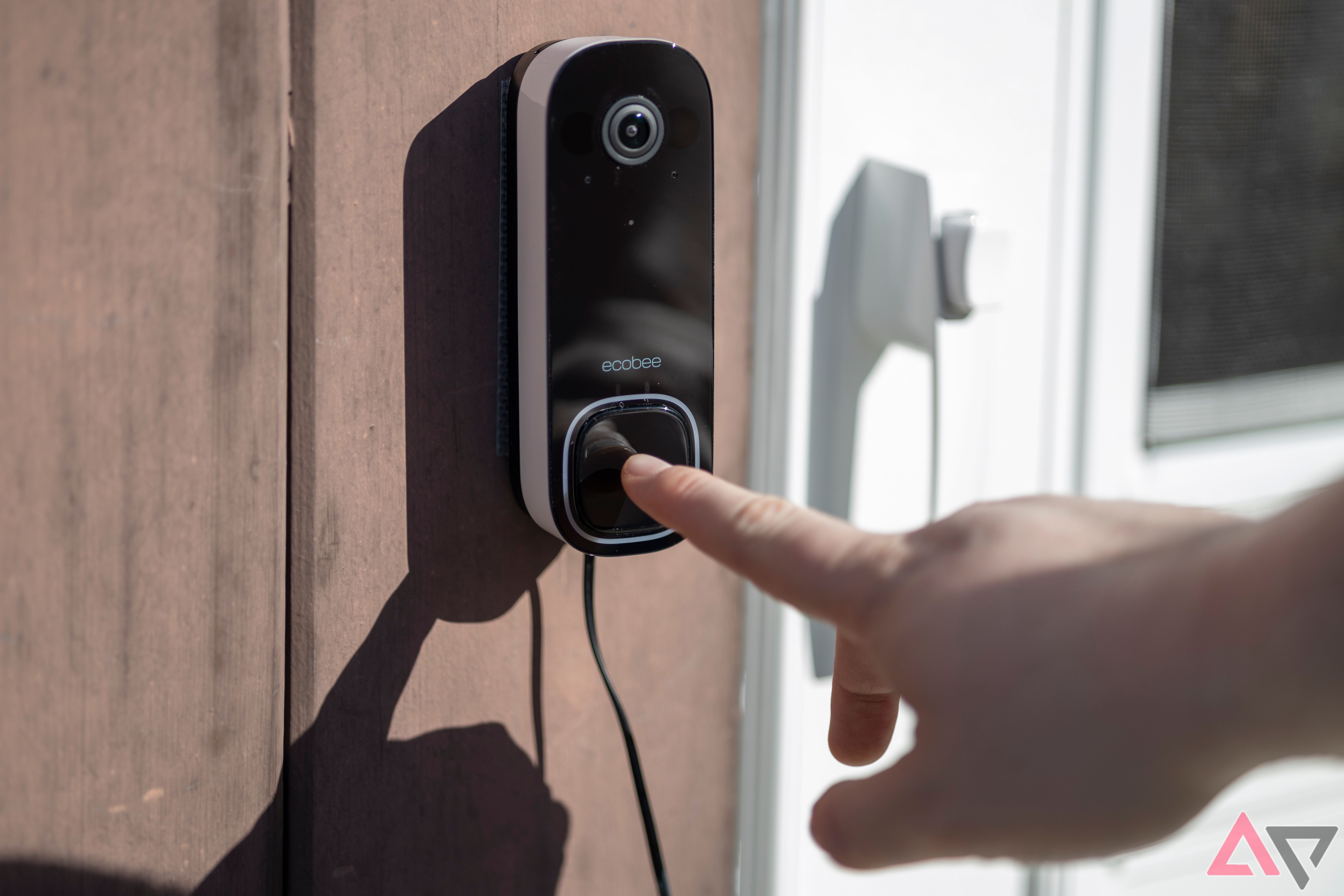 Person ringing Ecobee Smart Doorbell Camera (Wired)