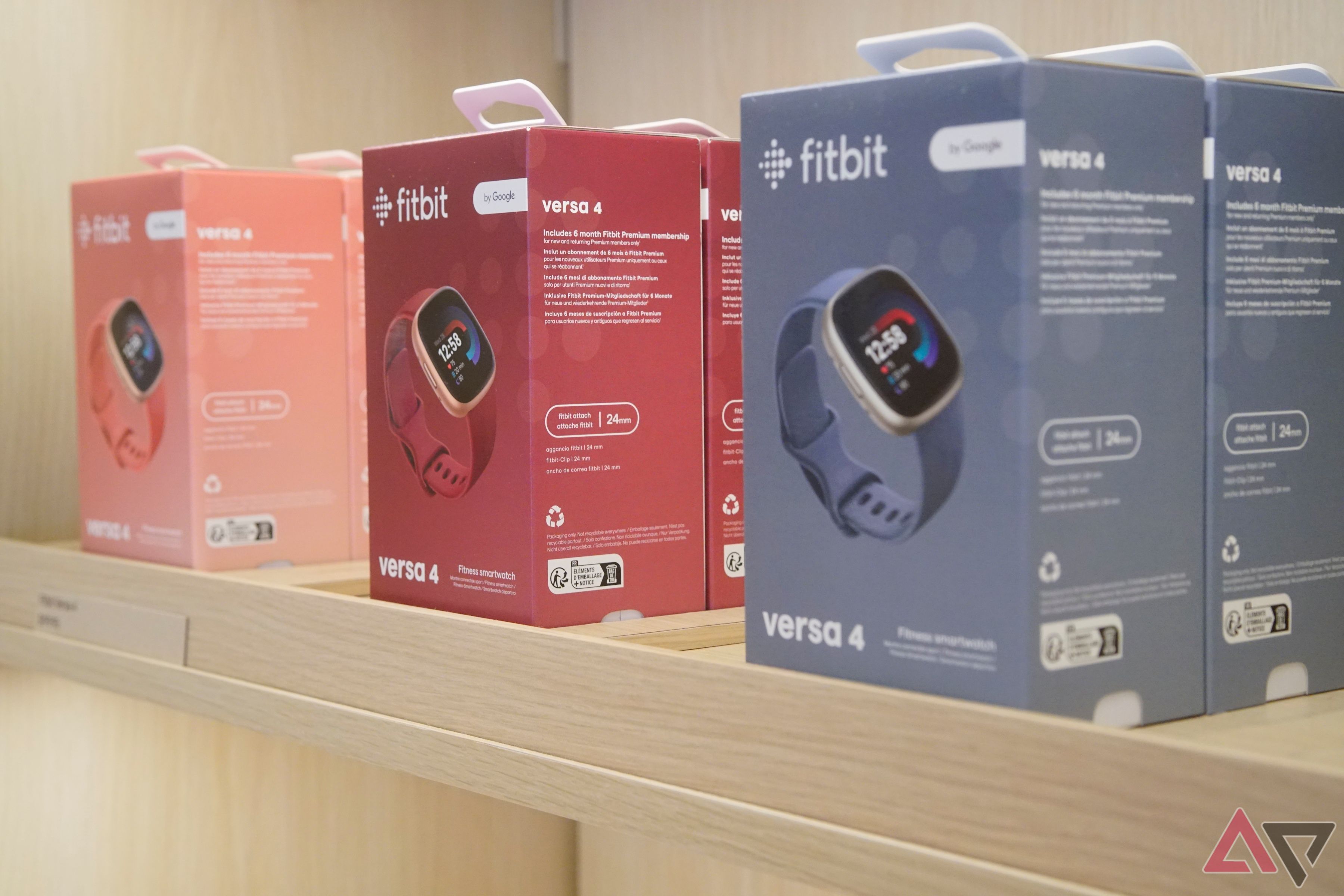 Boxes of Fitbit Versa 4 trackers at the Google Store in Boston.