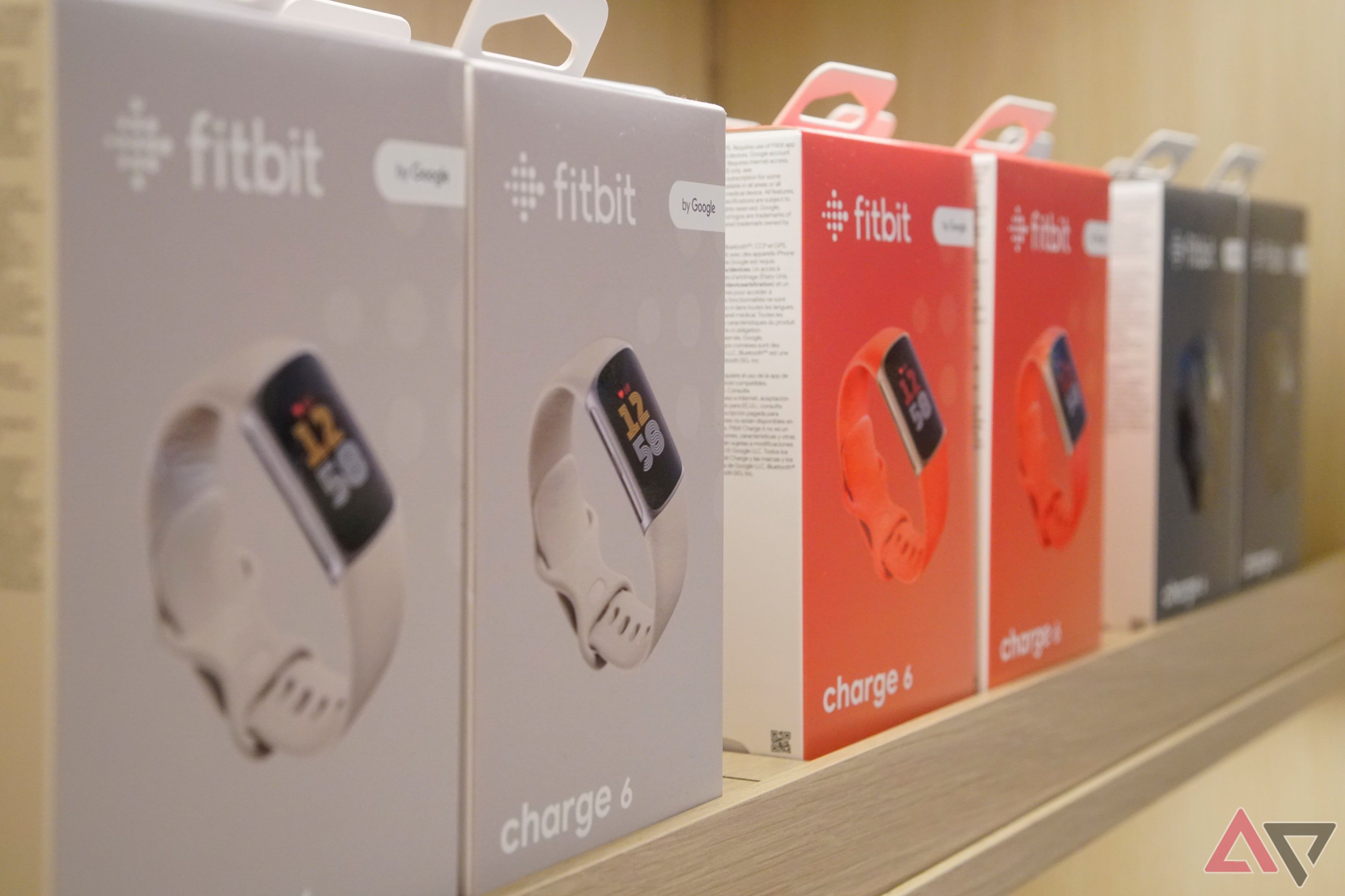Boxes of Fitbit Charge 6 trackers at the Google Store in Boston.