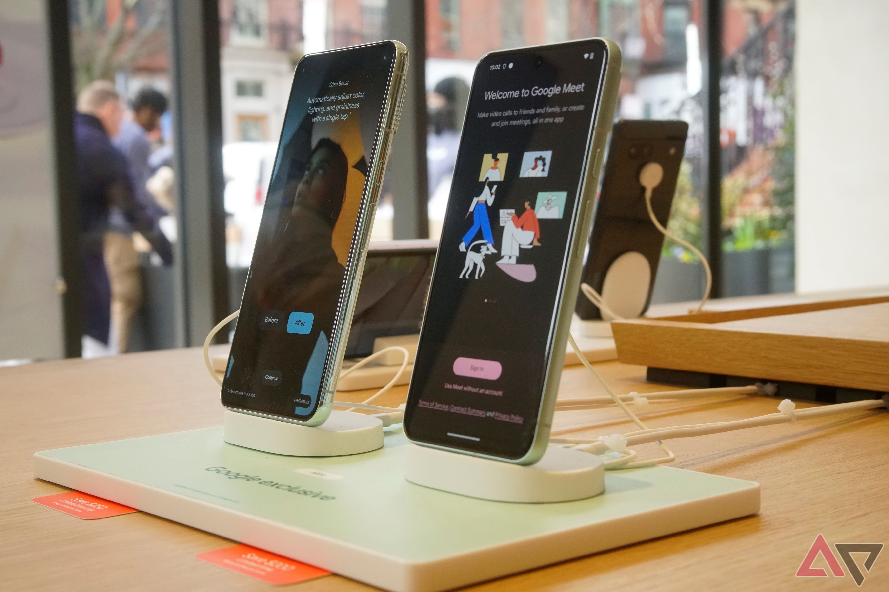 A Google Pixel 8 and 8 Pro on display at the Google Store in Boston.