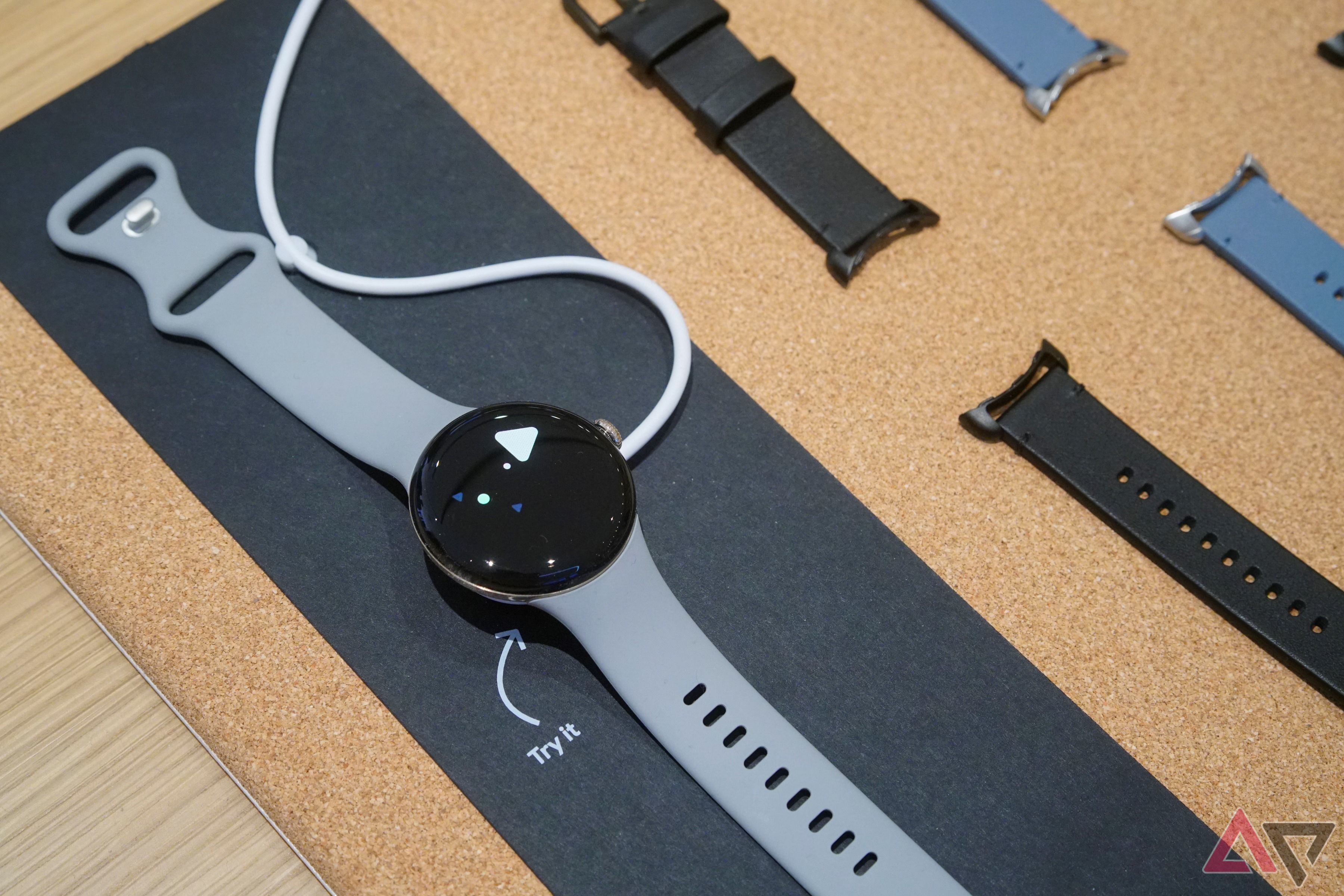 A Pixel Watch 2 laid out on a retail demonstration table.