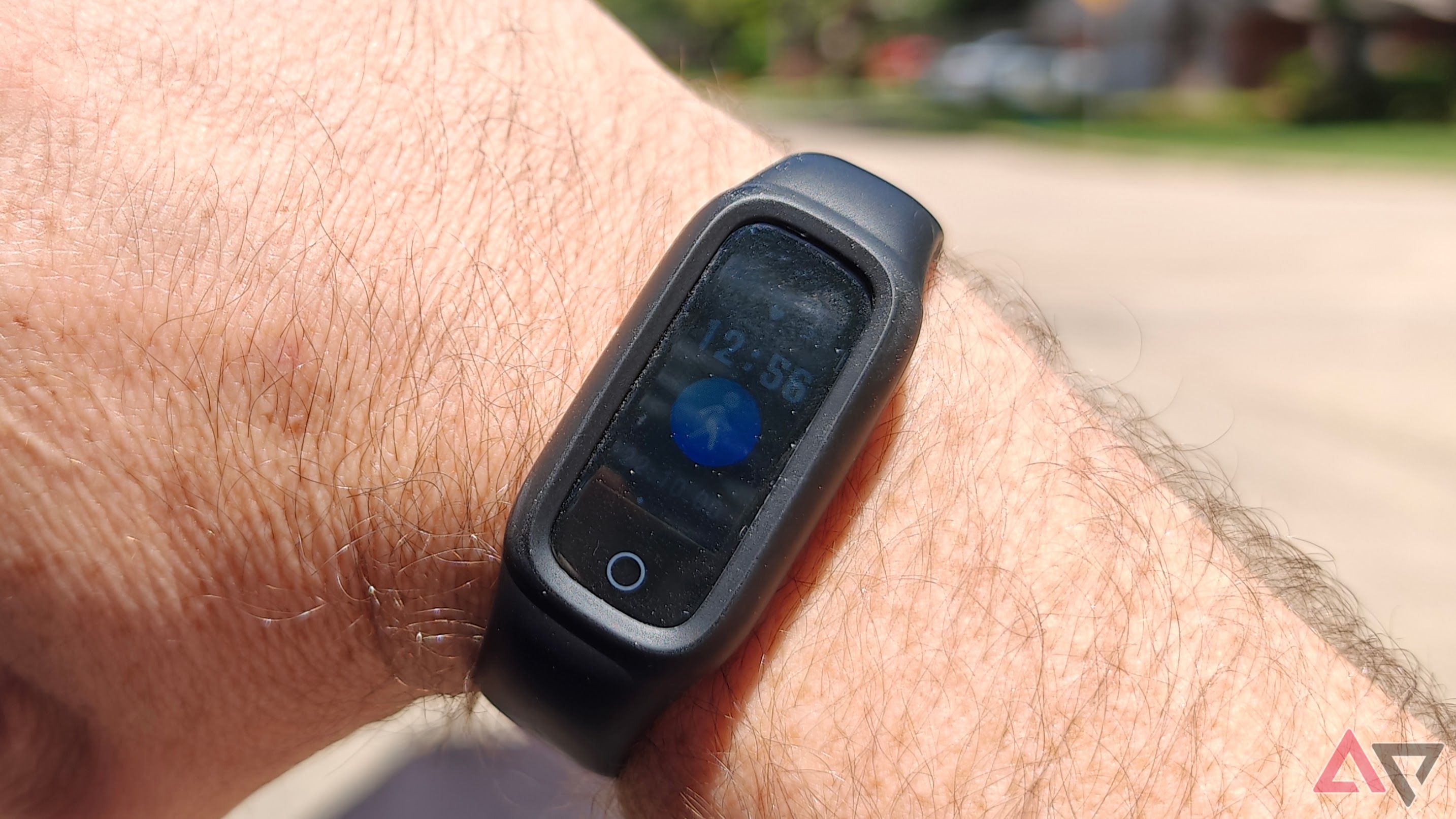 Fitness band worn on wrist in bright sunlight