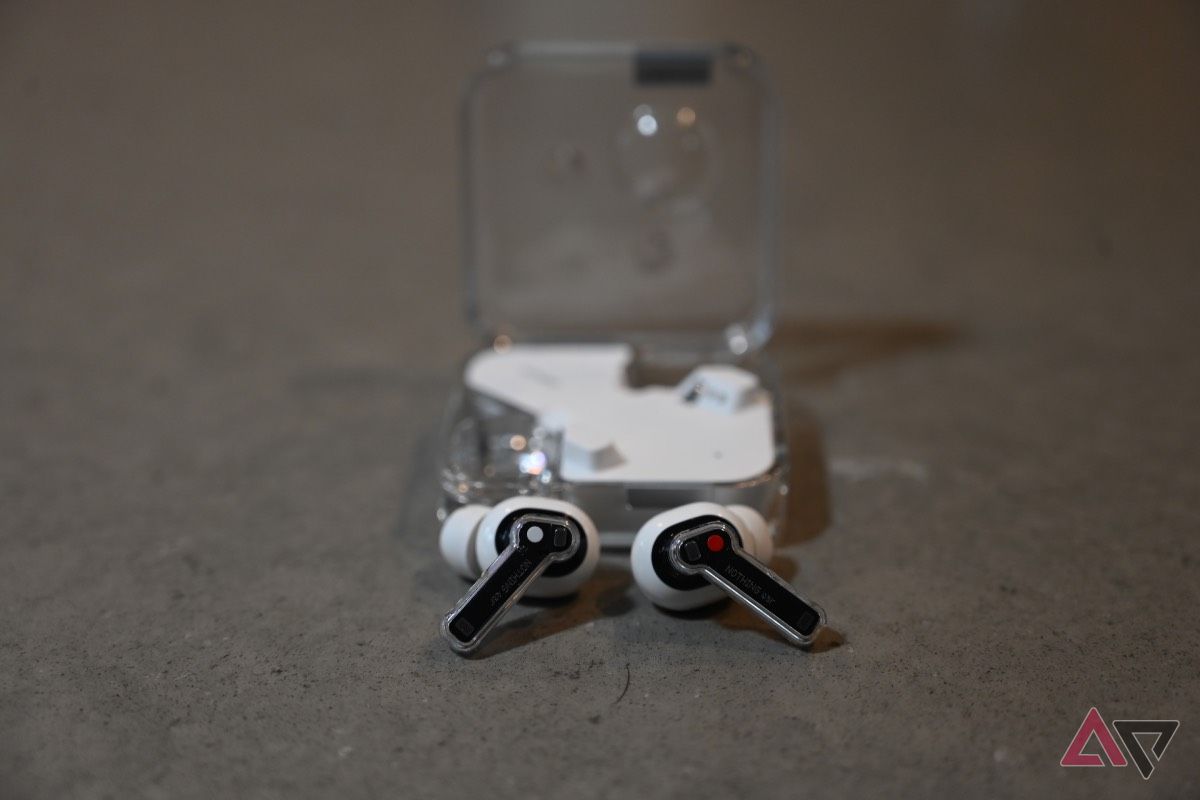 Shot of Nothing Ear earbuds with charging case