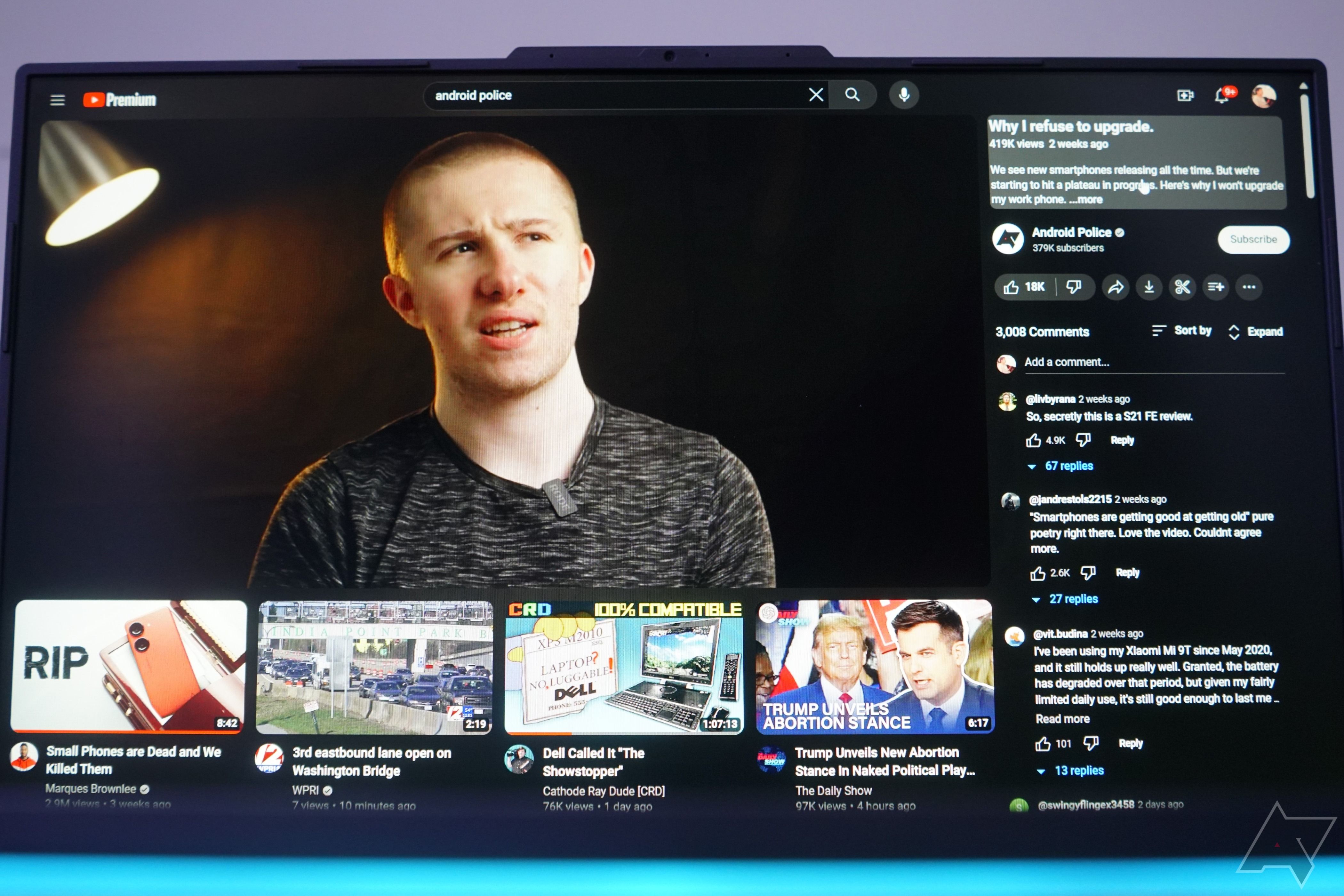 YouTube's desktop layout which debuted April 2024. It includes information and comments about the video on the right-side pane and large thumbnails for other videos at the bottom.