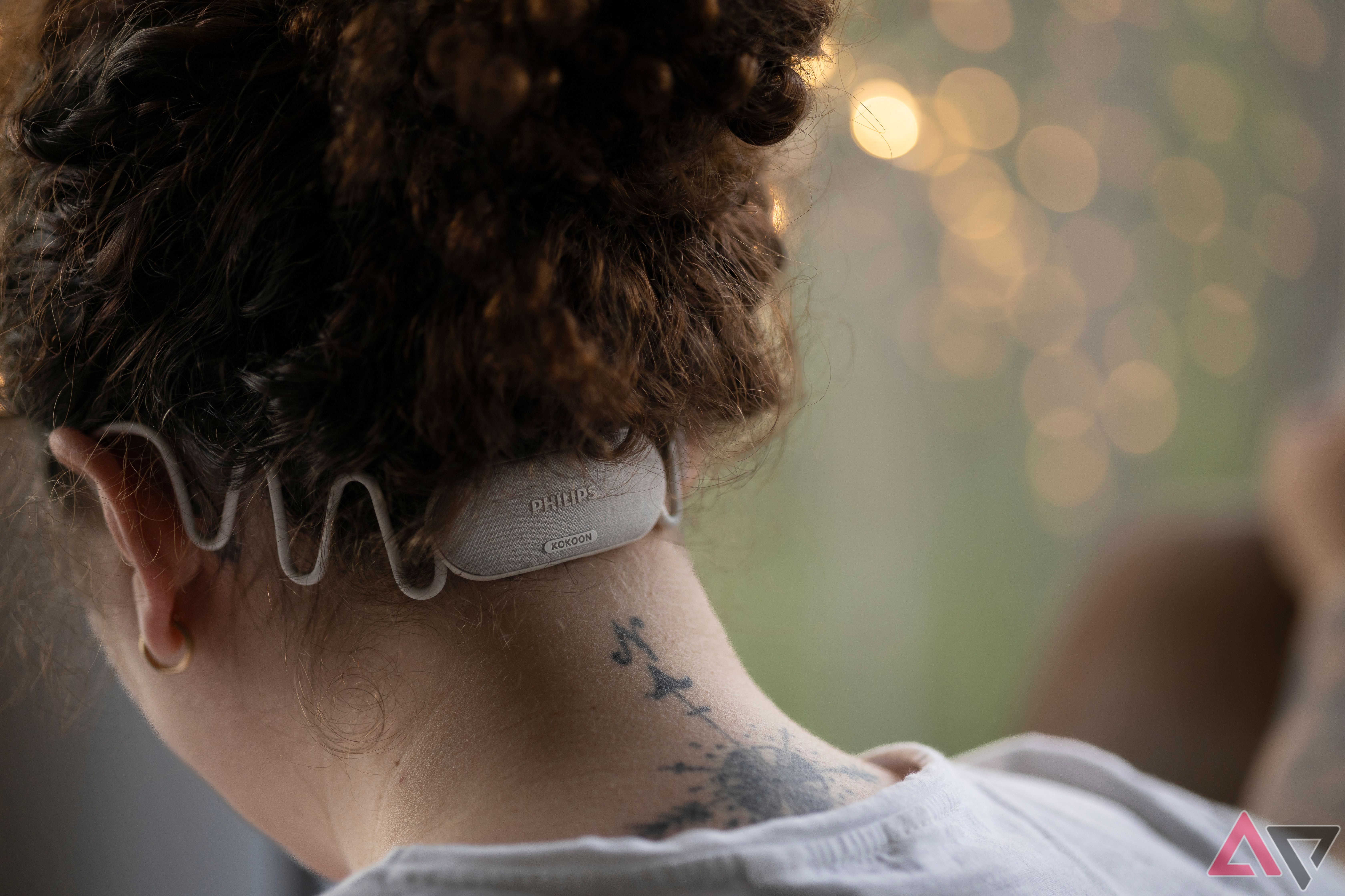 Back angle of person wearing Philips Kokoon Sleep Headphones