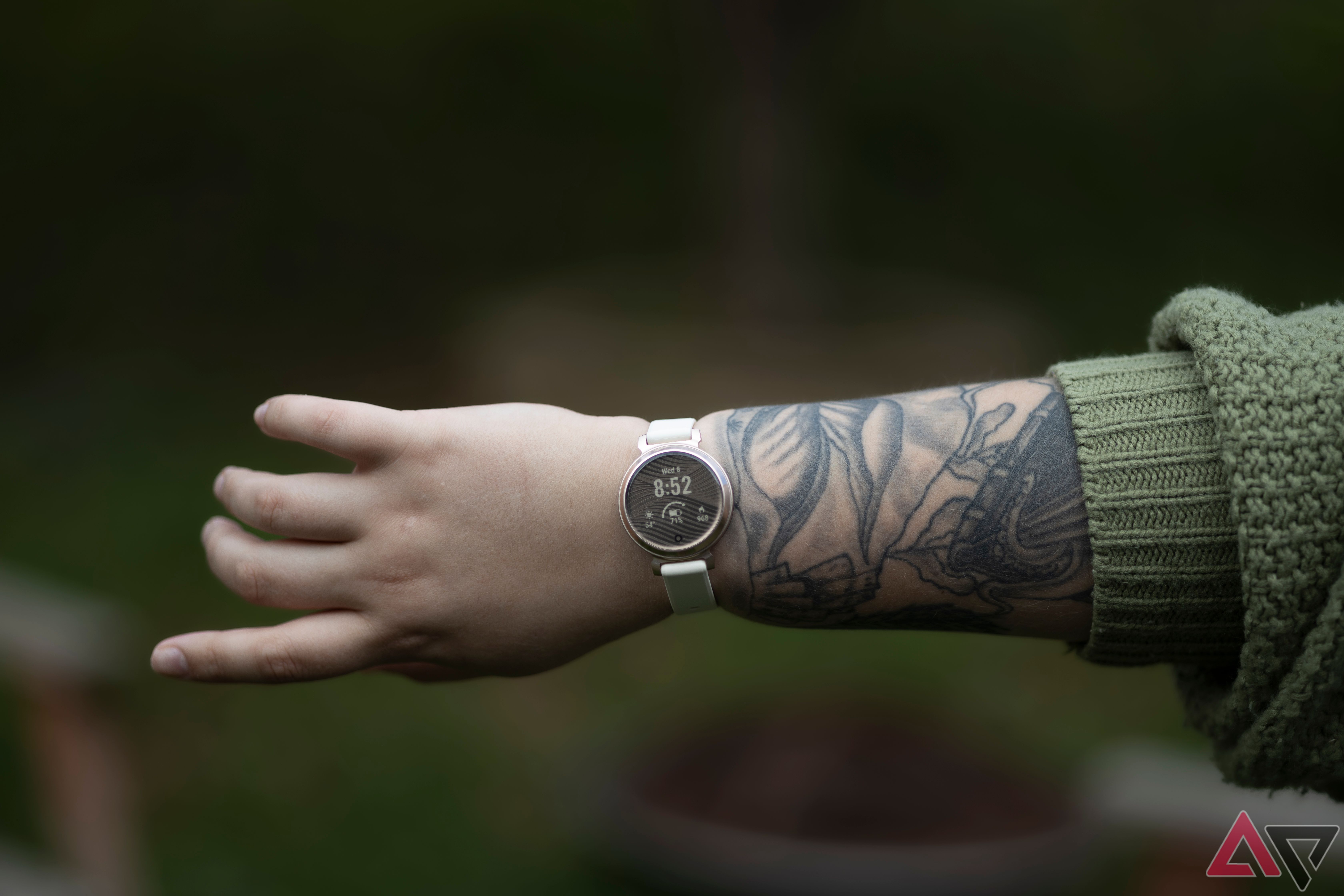 Woman's forearm wearing Garmin Lily 2 smartwatch