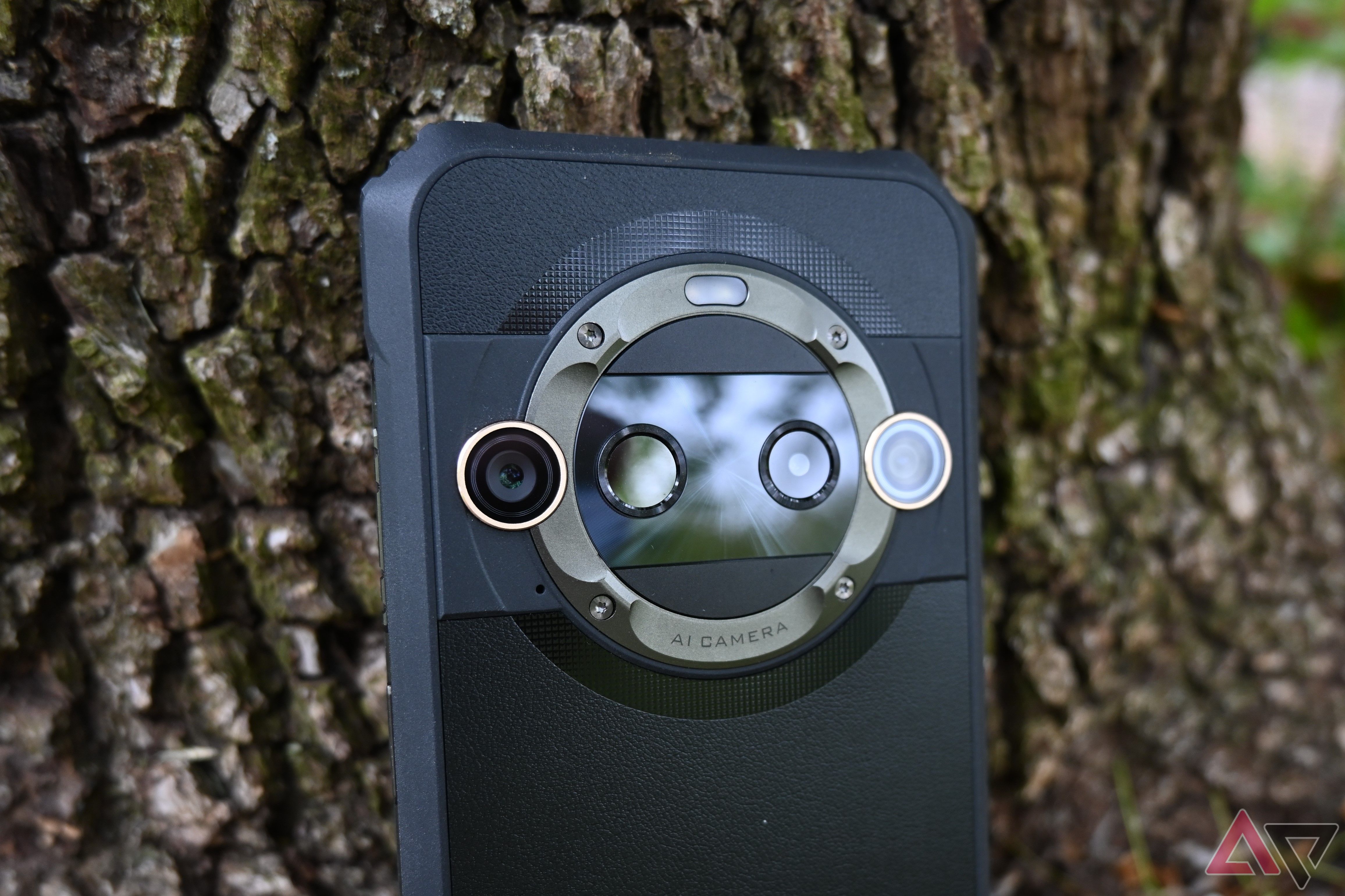 Blackview BL9000 Pro Cameras against a tree trunk