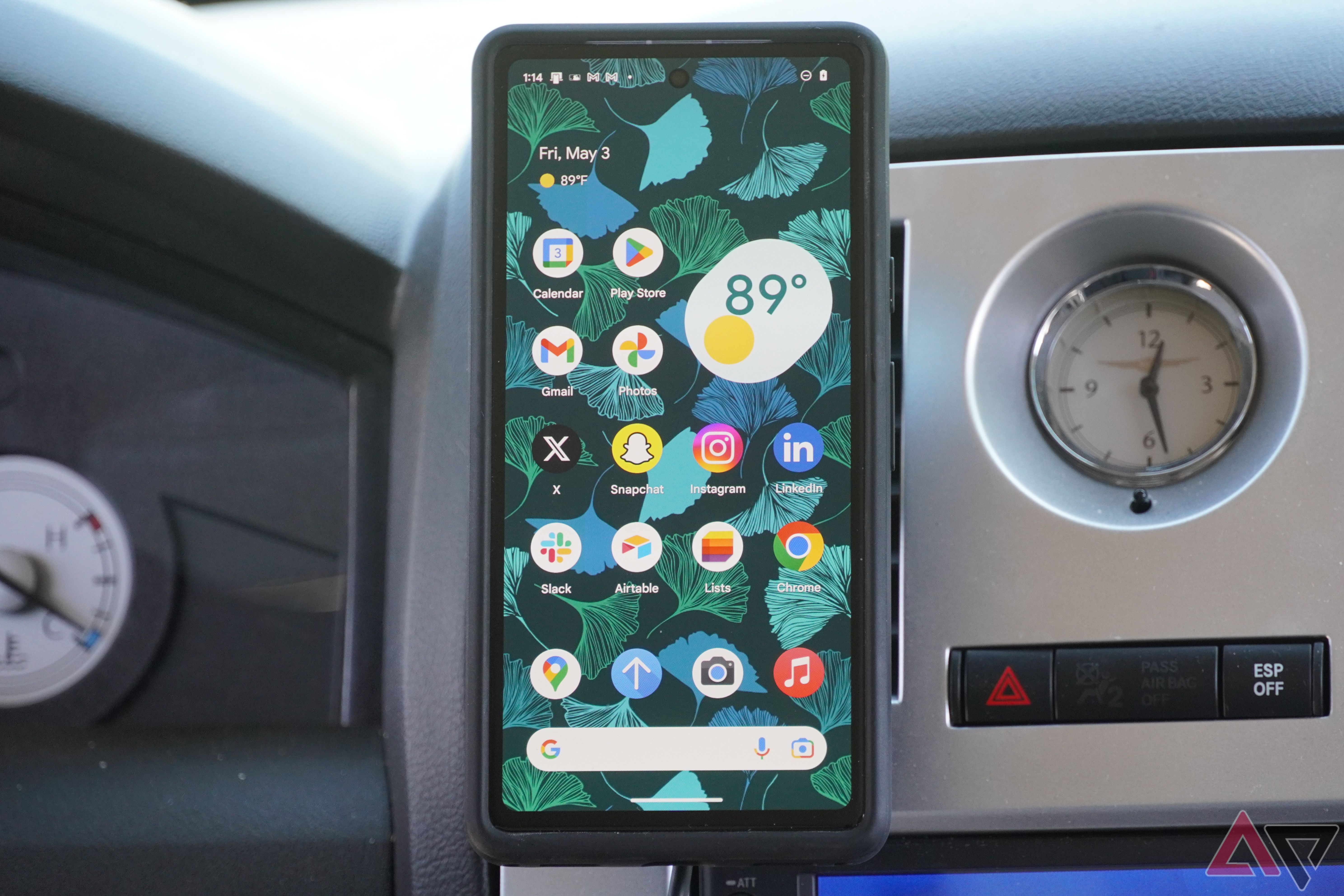 A head-on shot of the Pixel 7a mounted to the ESR Qi2 wireless car charger.