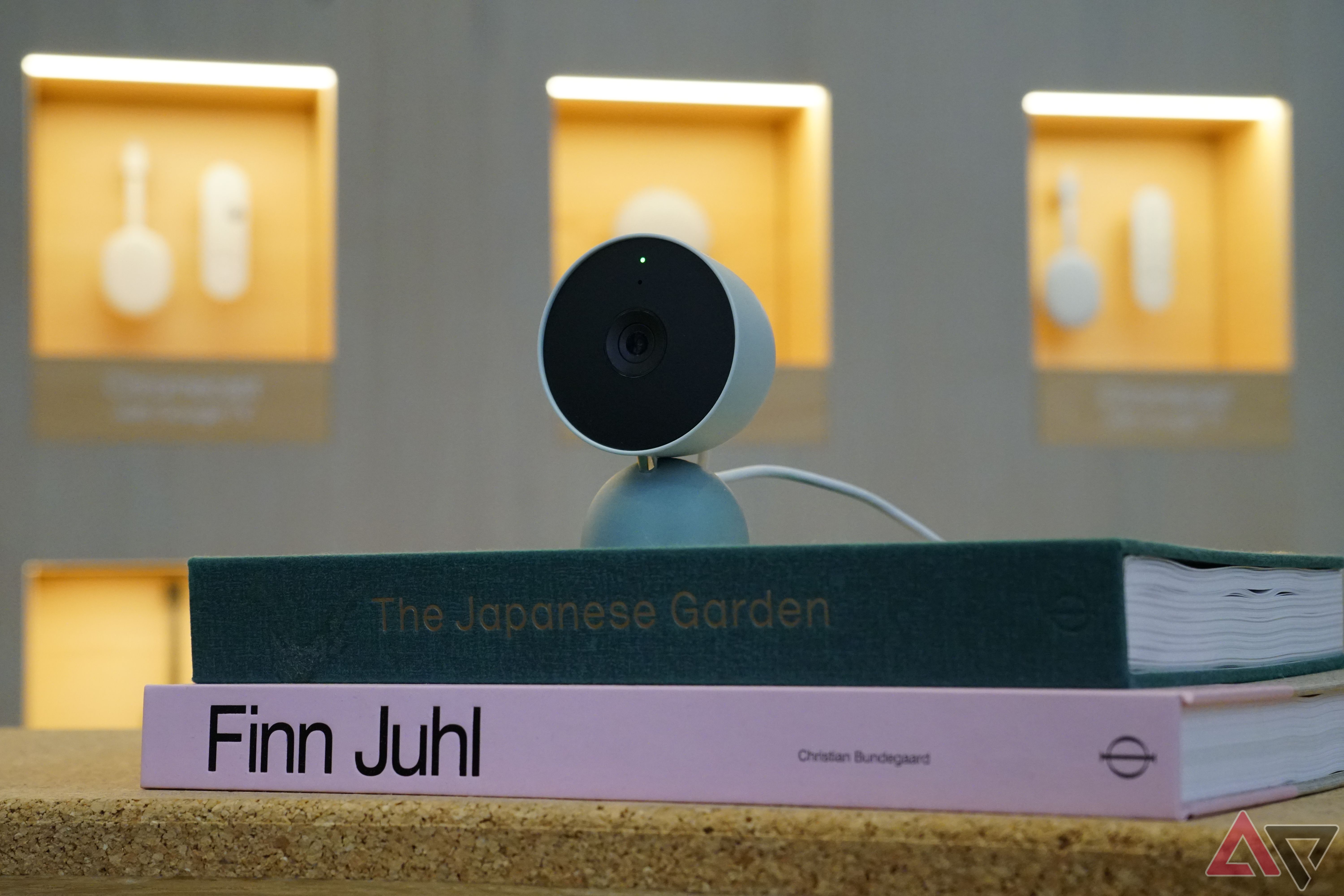 A Nest Cam Wired on display at a Google Store location.