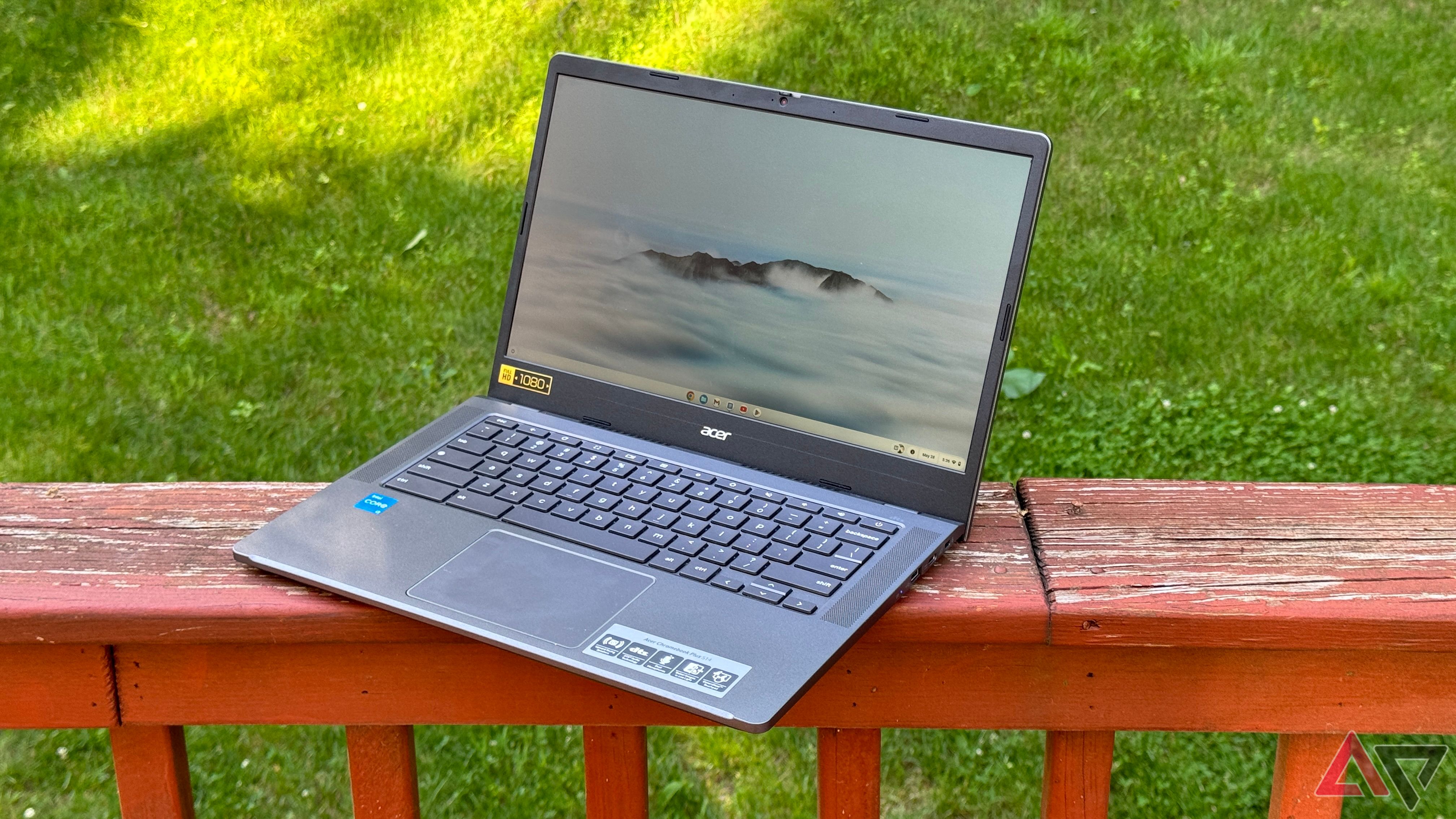 Acer Chromebook Plus 514 sitting on a wooden deck