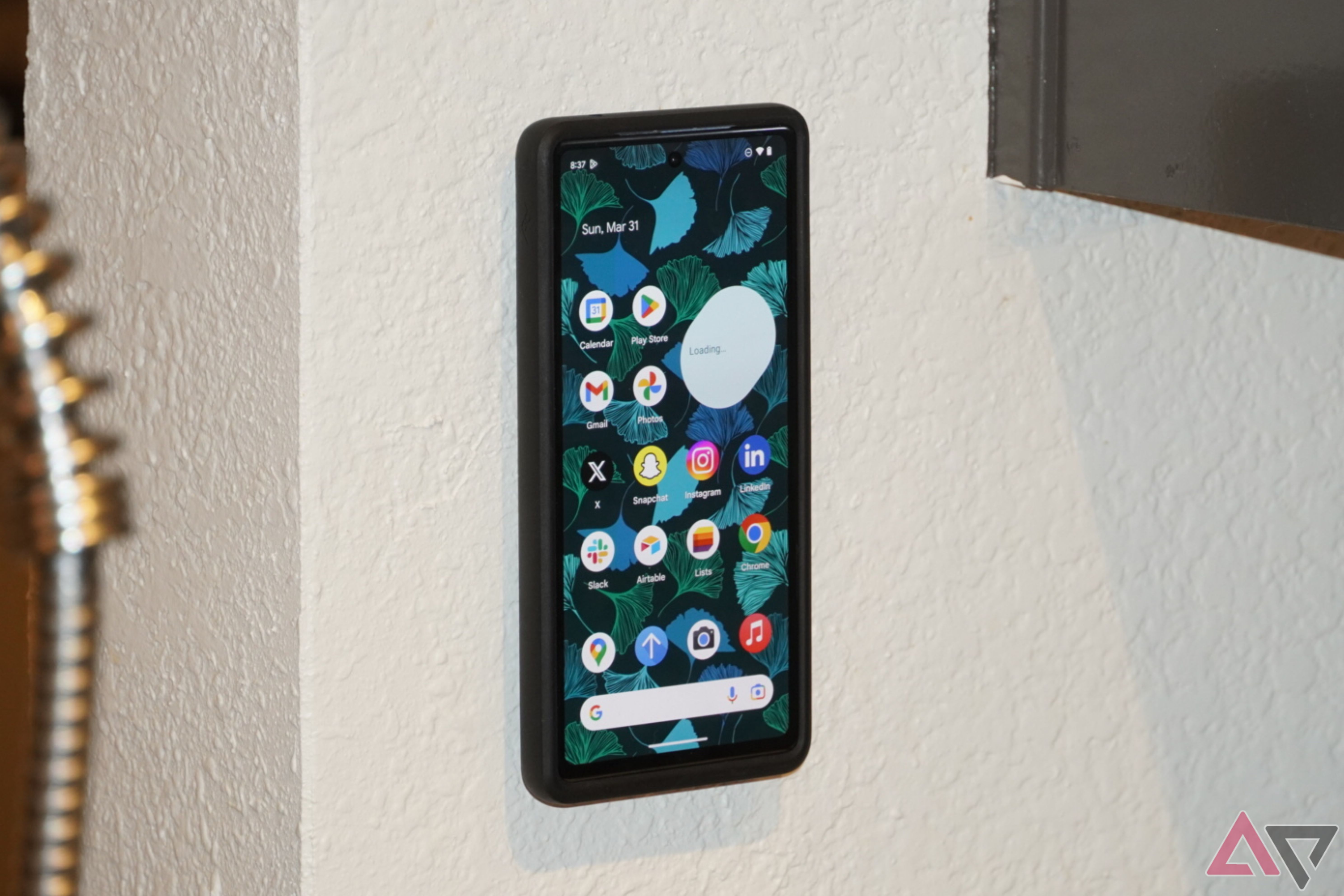 A Pixel 7a on a Peak Design Wall Mount.