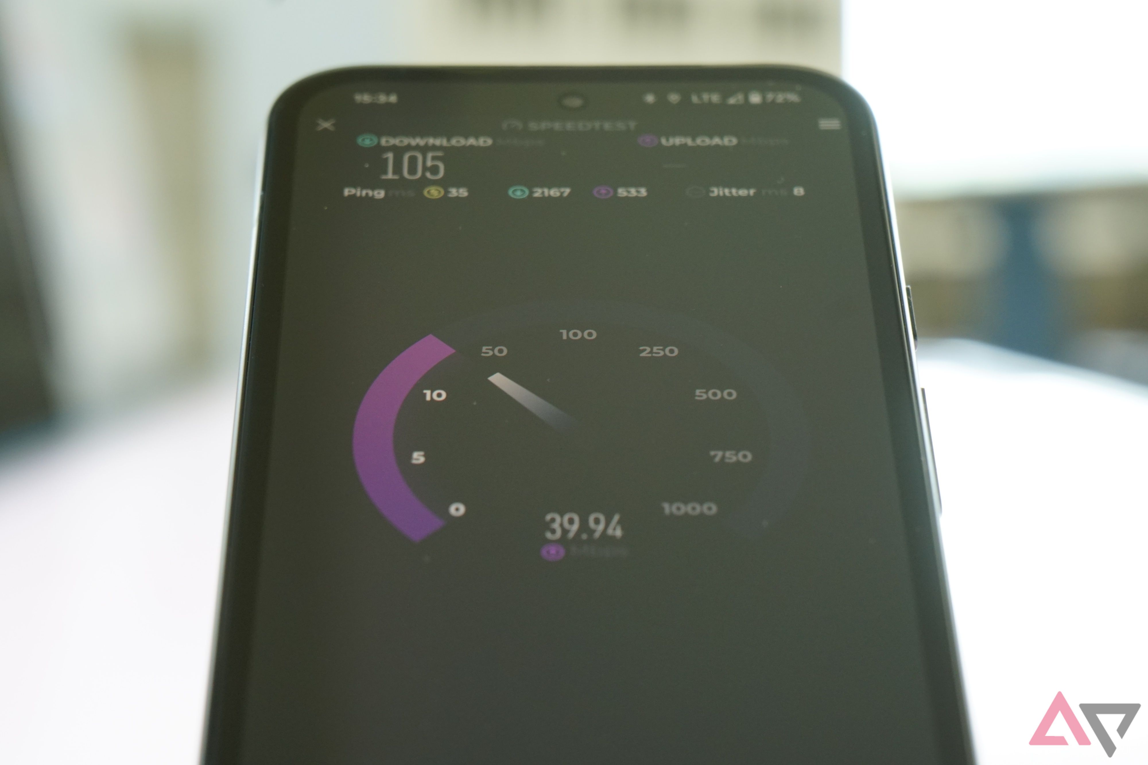 The Speedtest app in the middle of conducting a connectivity test.