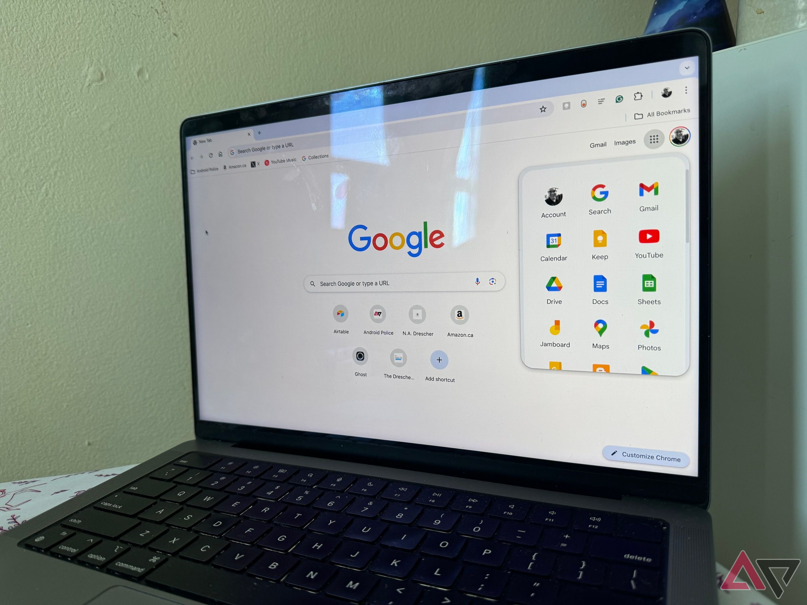 Google Chrome open on a MacBook Pro showing the Google Apps menu.