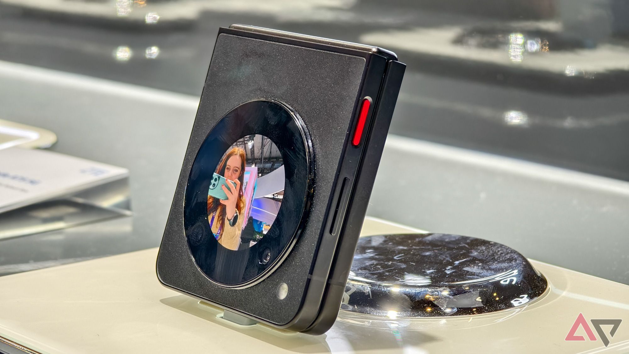 The Nubia Flip 5G sitting on a table with its outer display on.