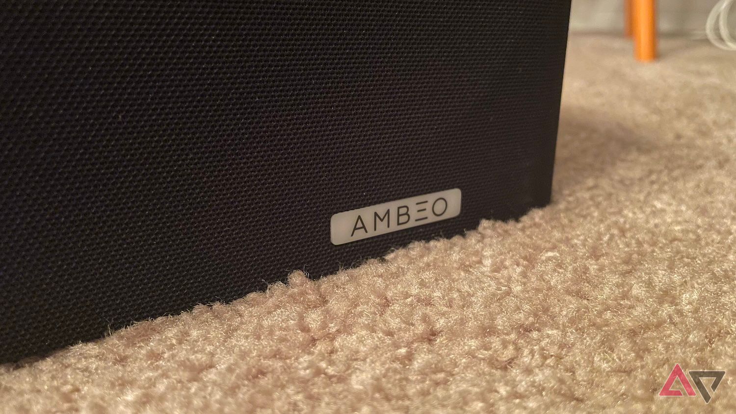 The Sennheiser Ambeo Max logo on the front of the soundbar