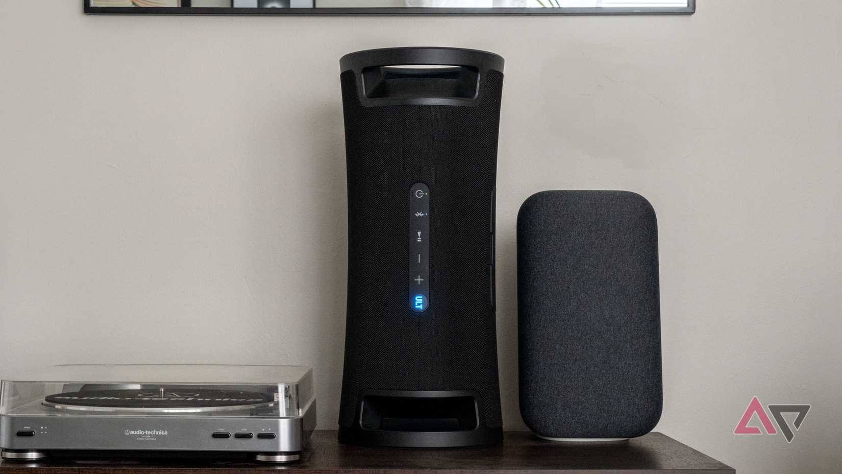 Sony speaker between the rotating disk and Google Speaker