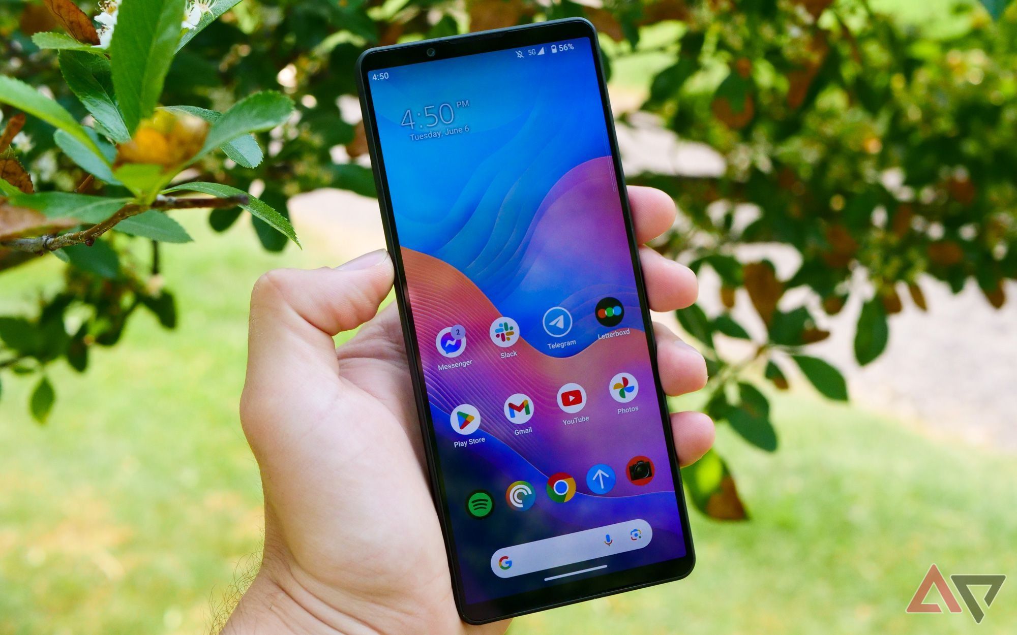 The Xperia 1 V being held in a hand.