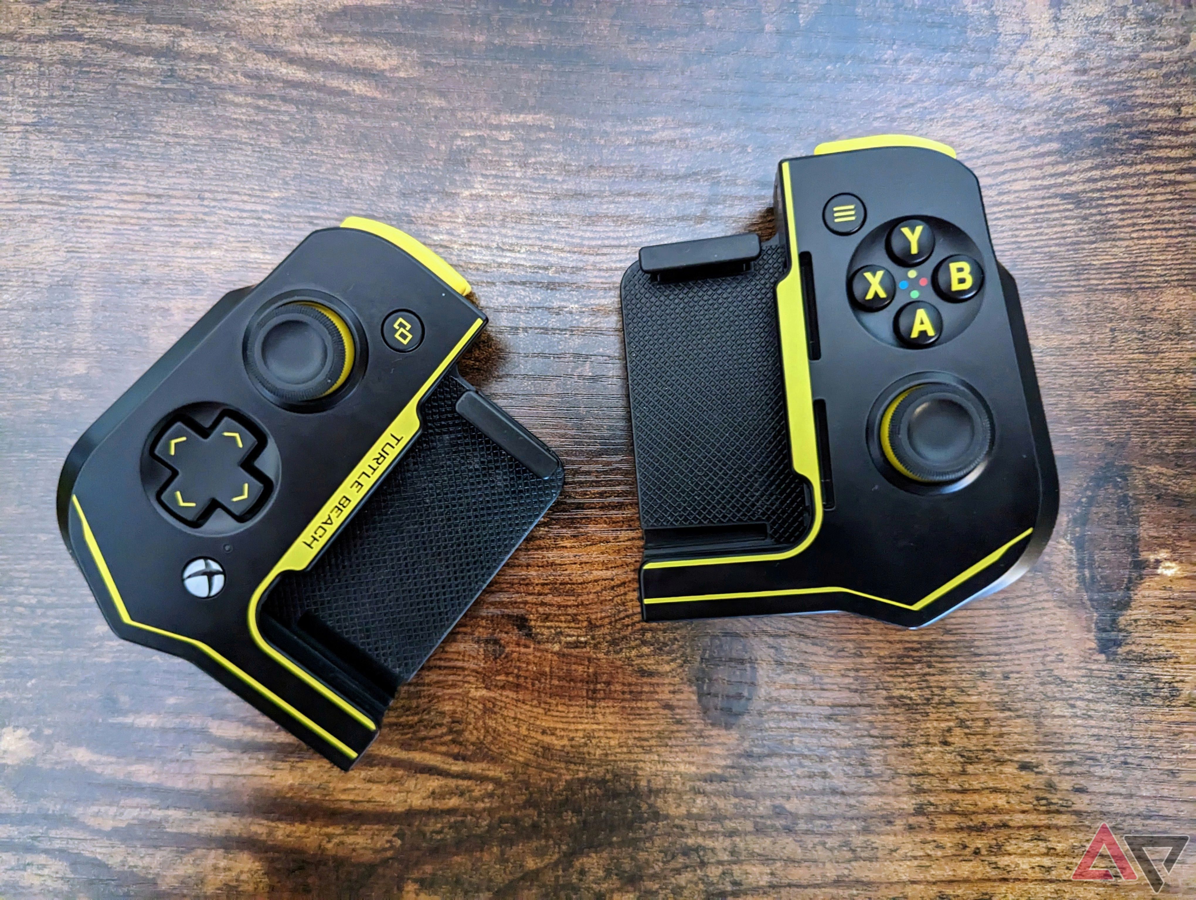 turtle beach atom controller on wood surface