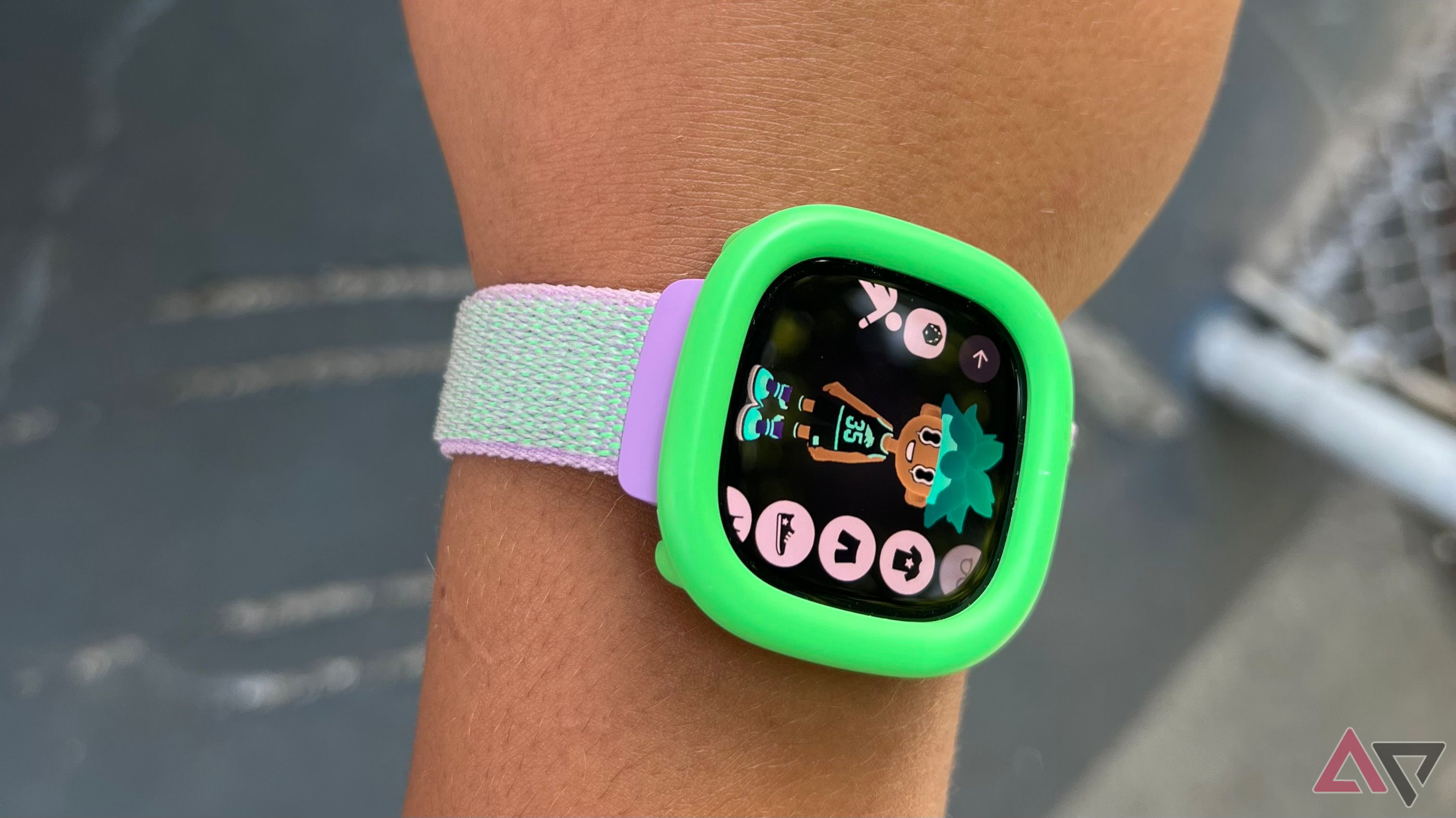 Fitbit Ace LTE on wrist with eejie on screen