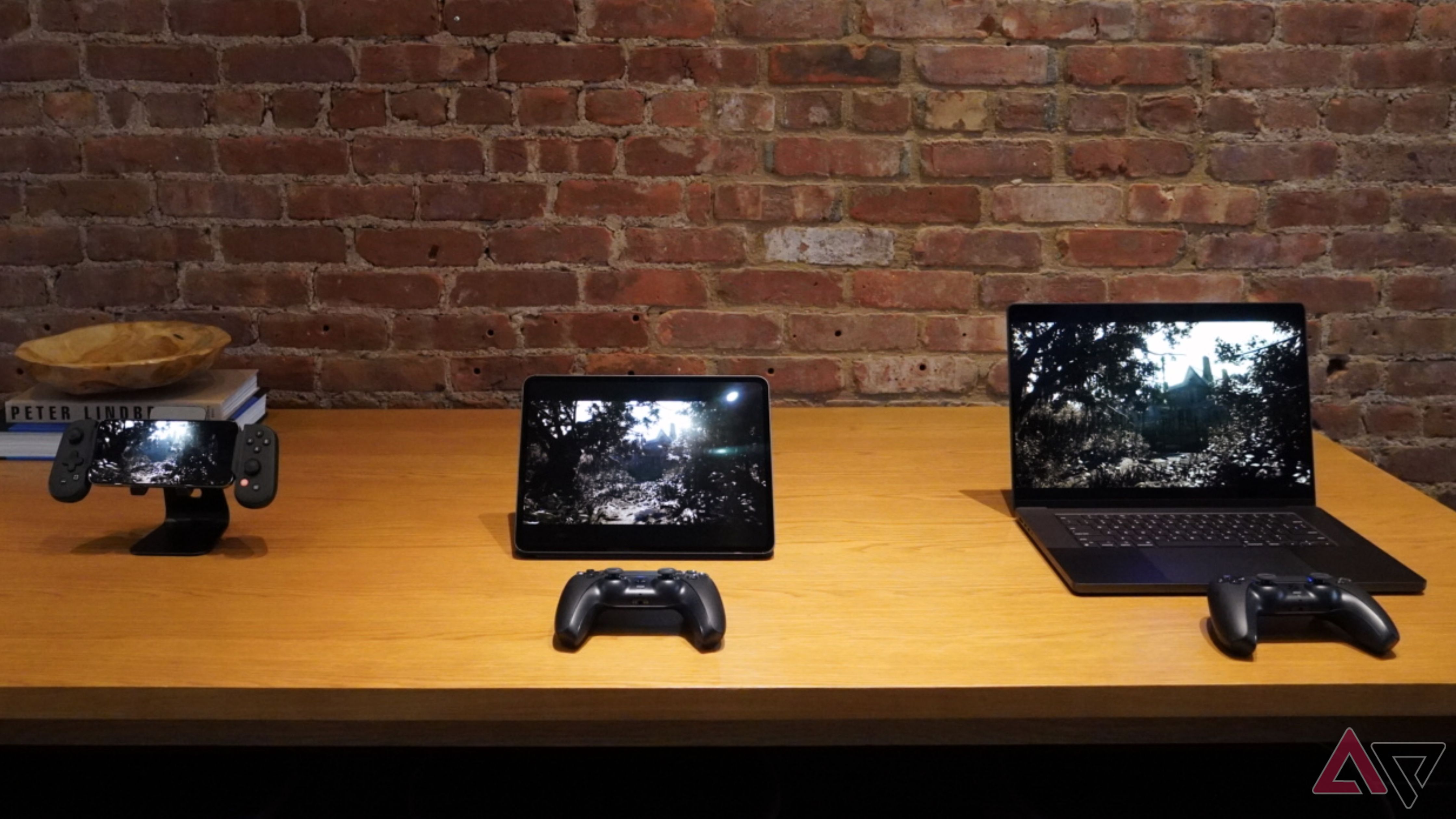 Games running on three Apple devices.