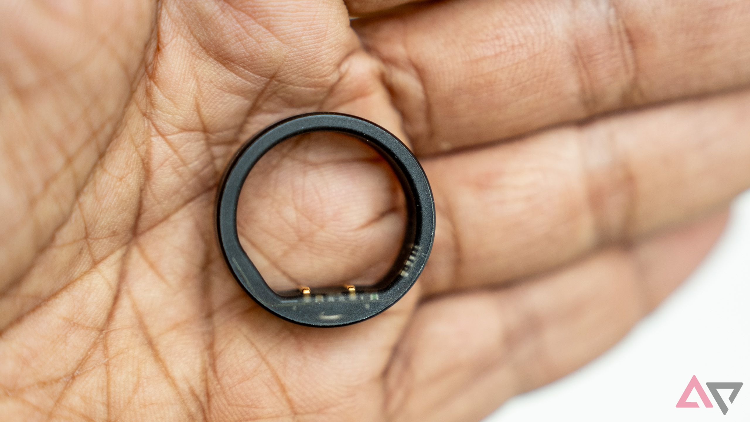 The Circular Ring Slim in the palm of a hand