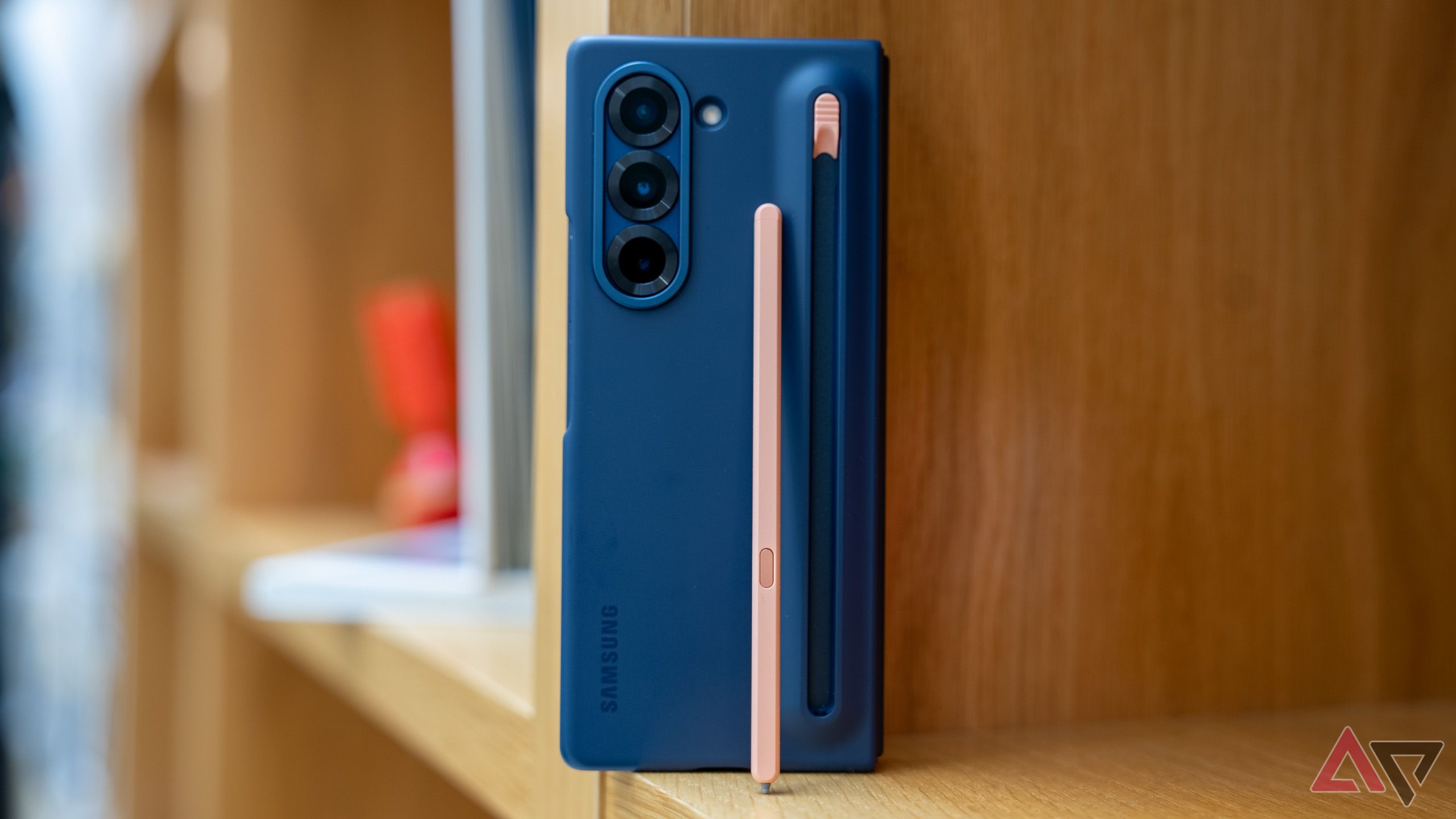 Galaxy Z Fold 6 case and S Pen on the bookshelf