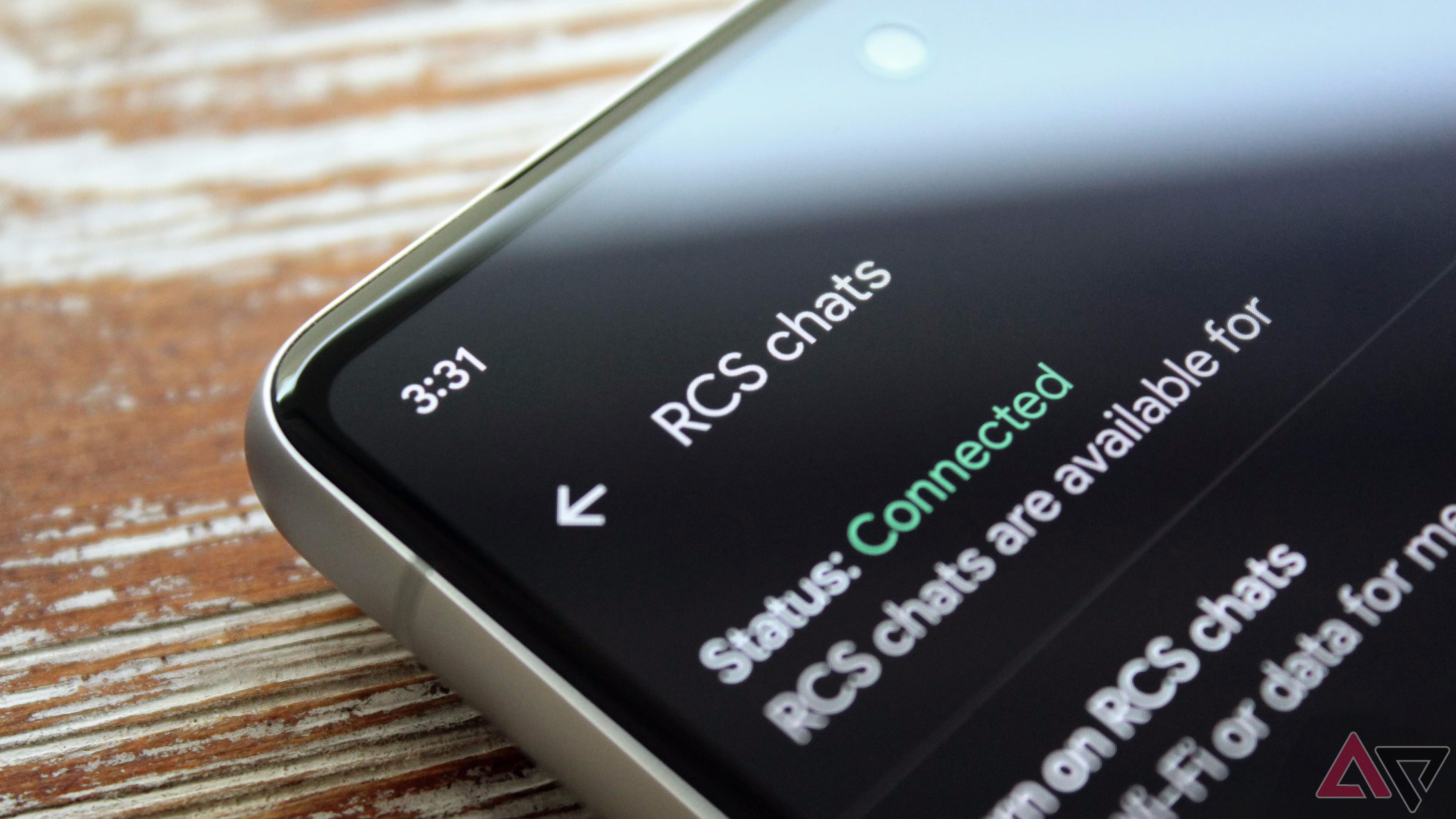 Closeup of a phone showing RCS chats settings on its screen