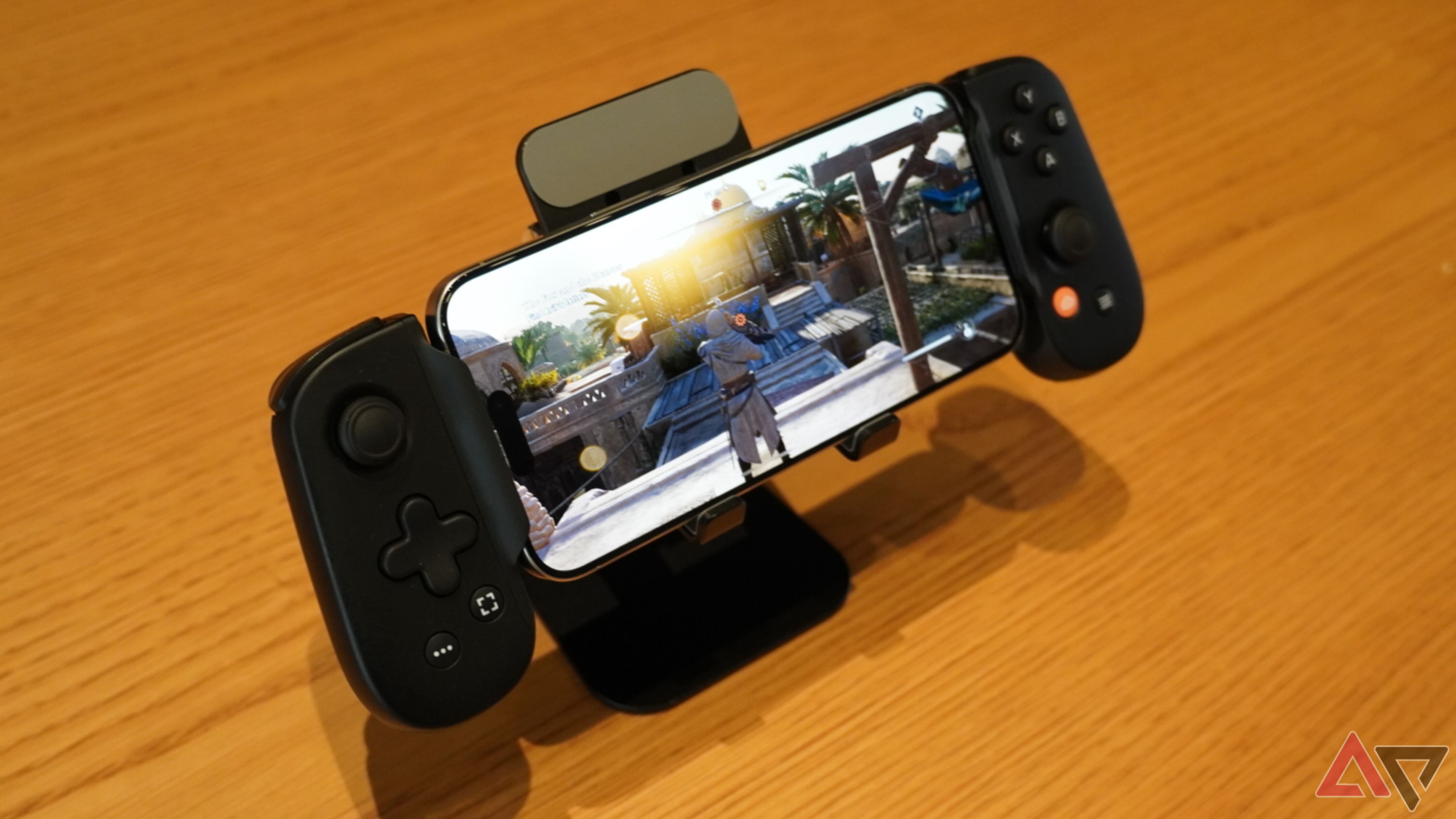 An iPhone 15 Pro playing an AAA mobile game. 