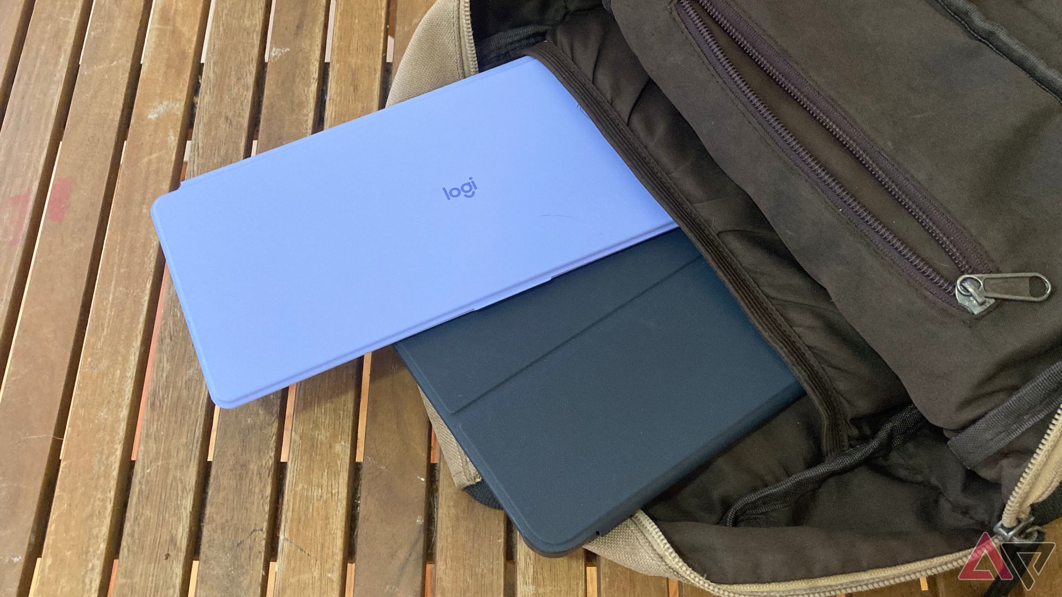 The Logitech Keys-To-Go 2 and a 12" tablet in a messenger bag