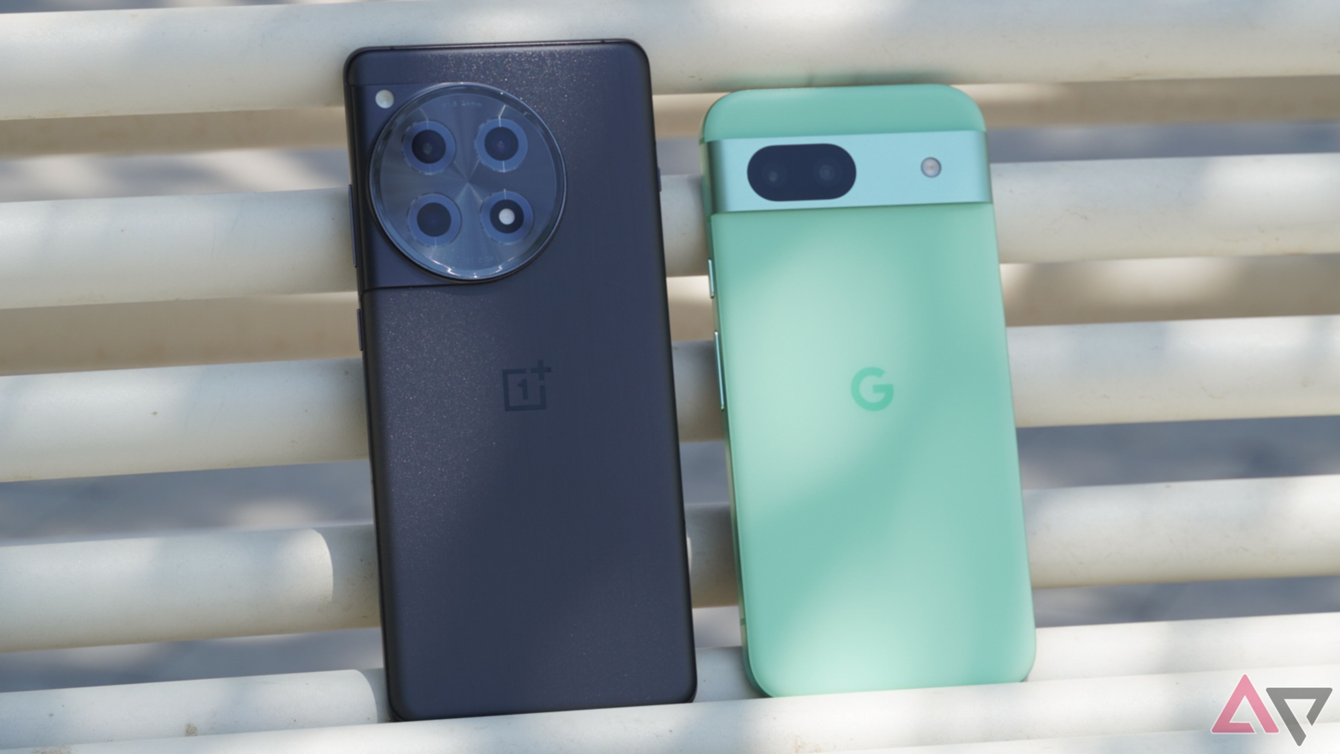 The size difference between the OnePlus 12R (left) and Google Pixel 8a (right).