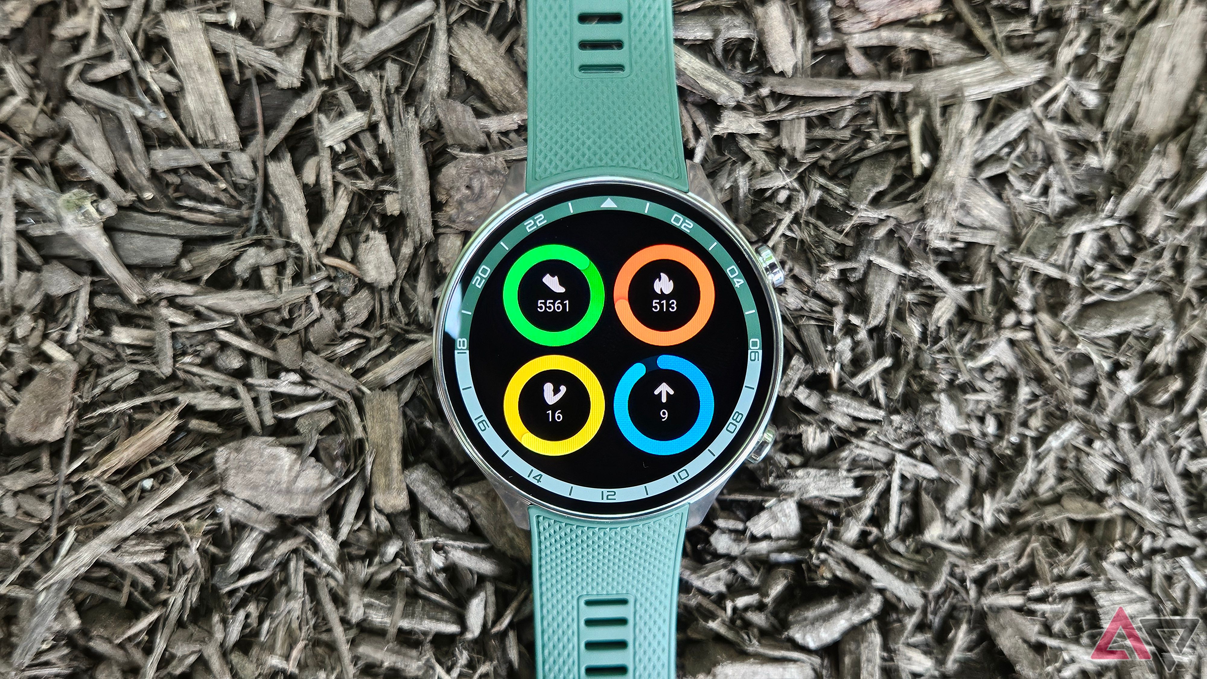 OnePlus Watch 2R showing various daily health metrics on a mulch background.