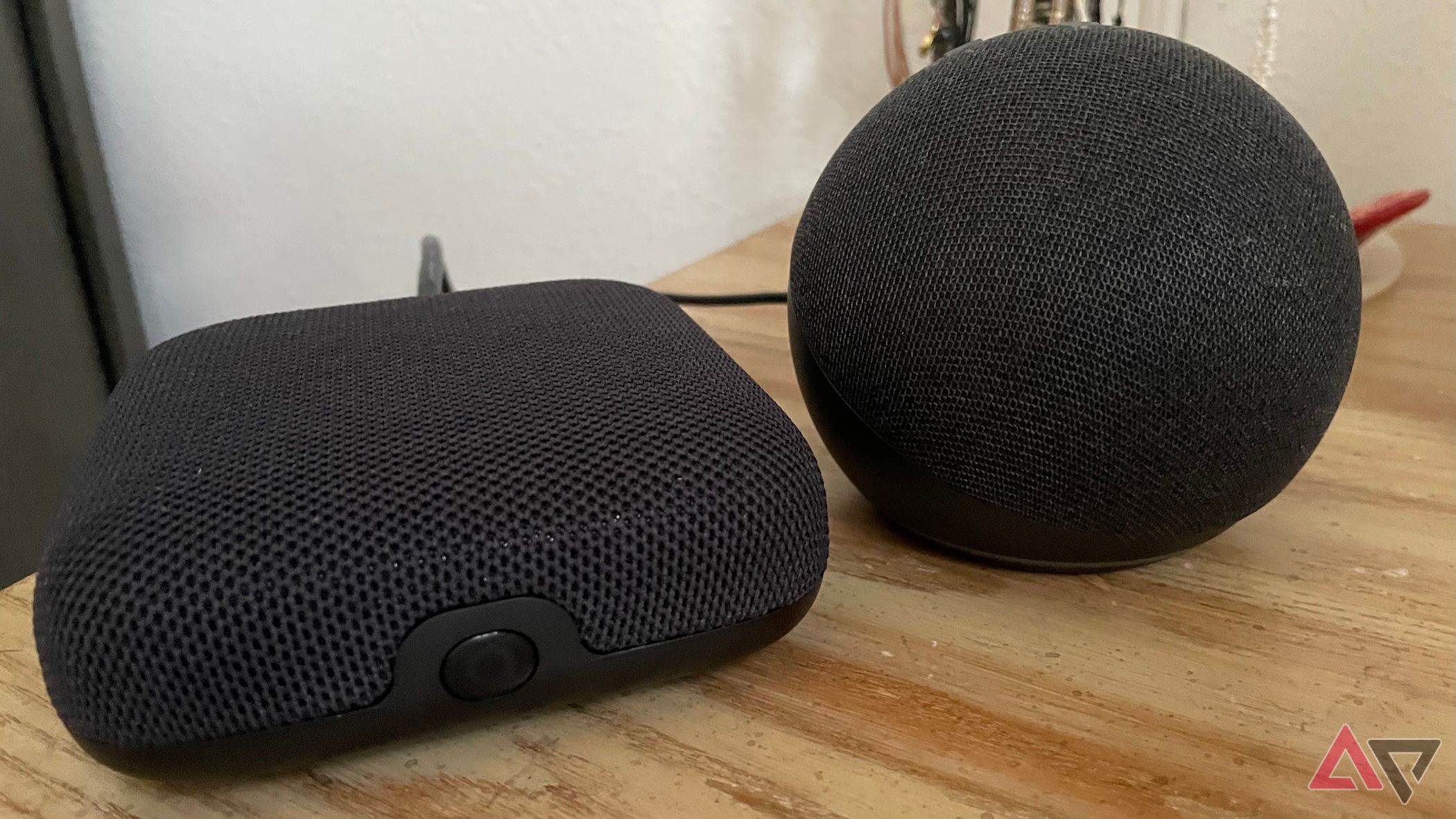 The Onn Google TV 4K Pro next to an Amazon Echo Dot (4th Gen)