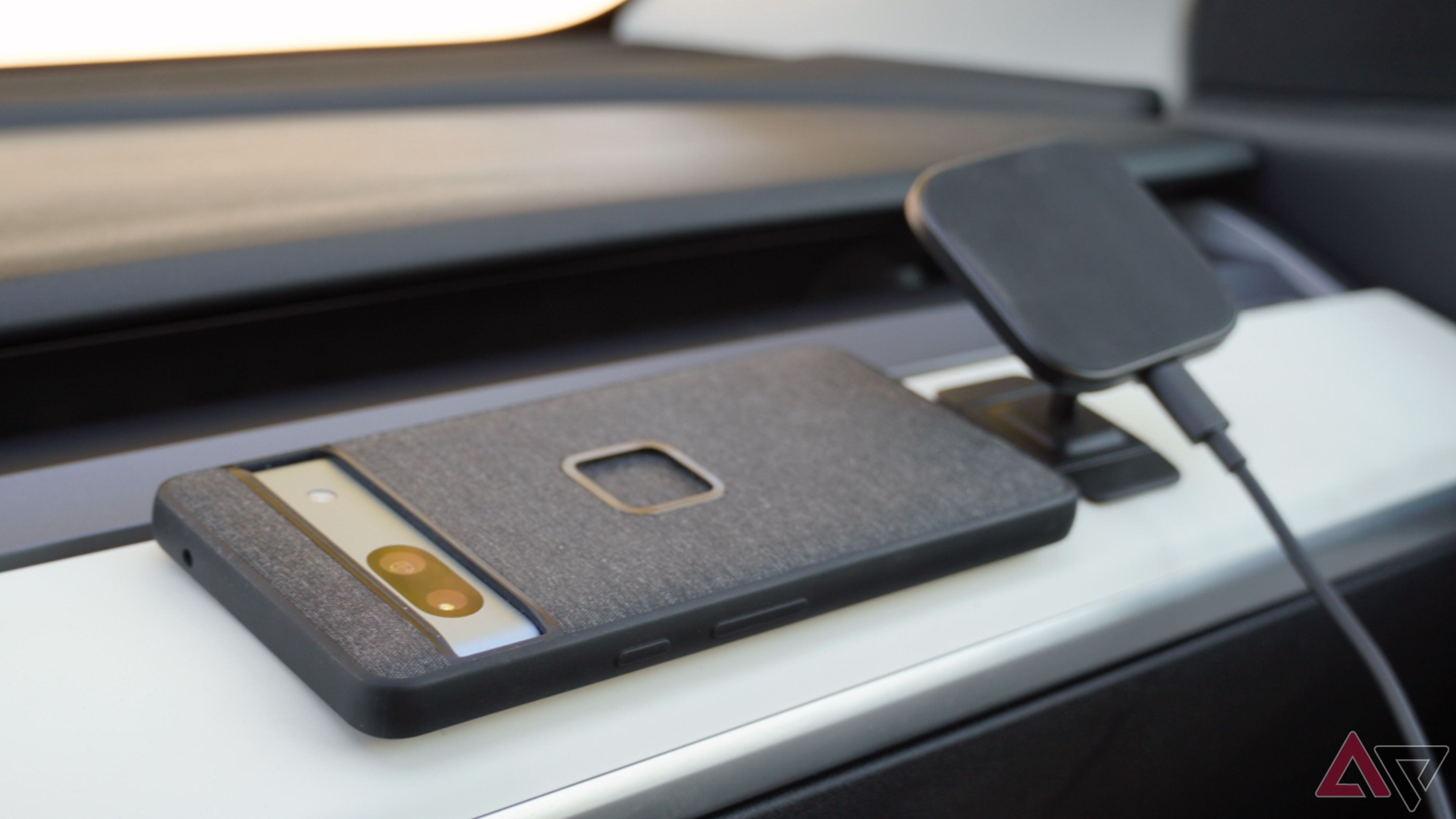 The Peak Design Everyday Case on the dash with a Car Mount.