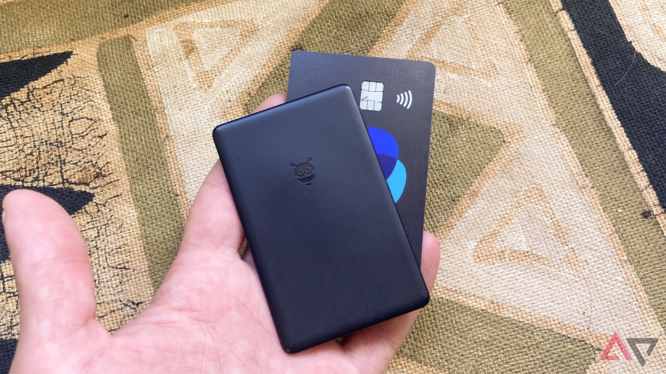 The Pebblebee Card's size compared to a credit card