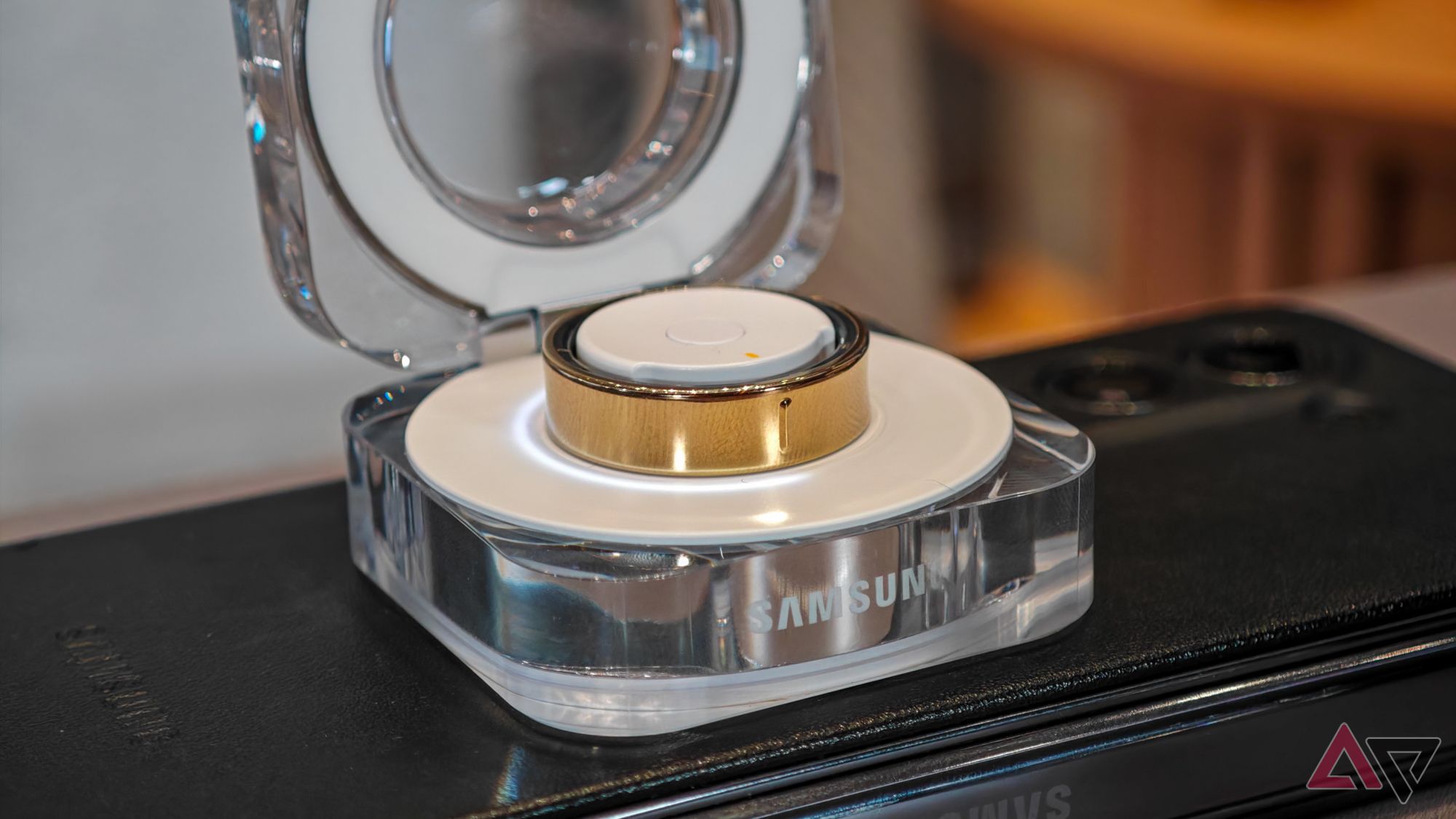 The Samsung Galaxy Ring in the charging case