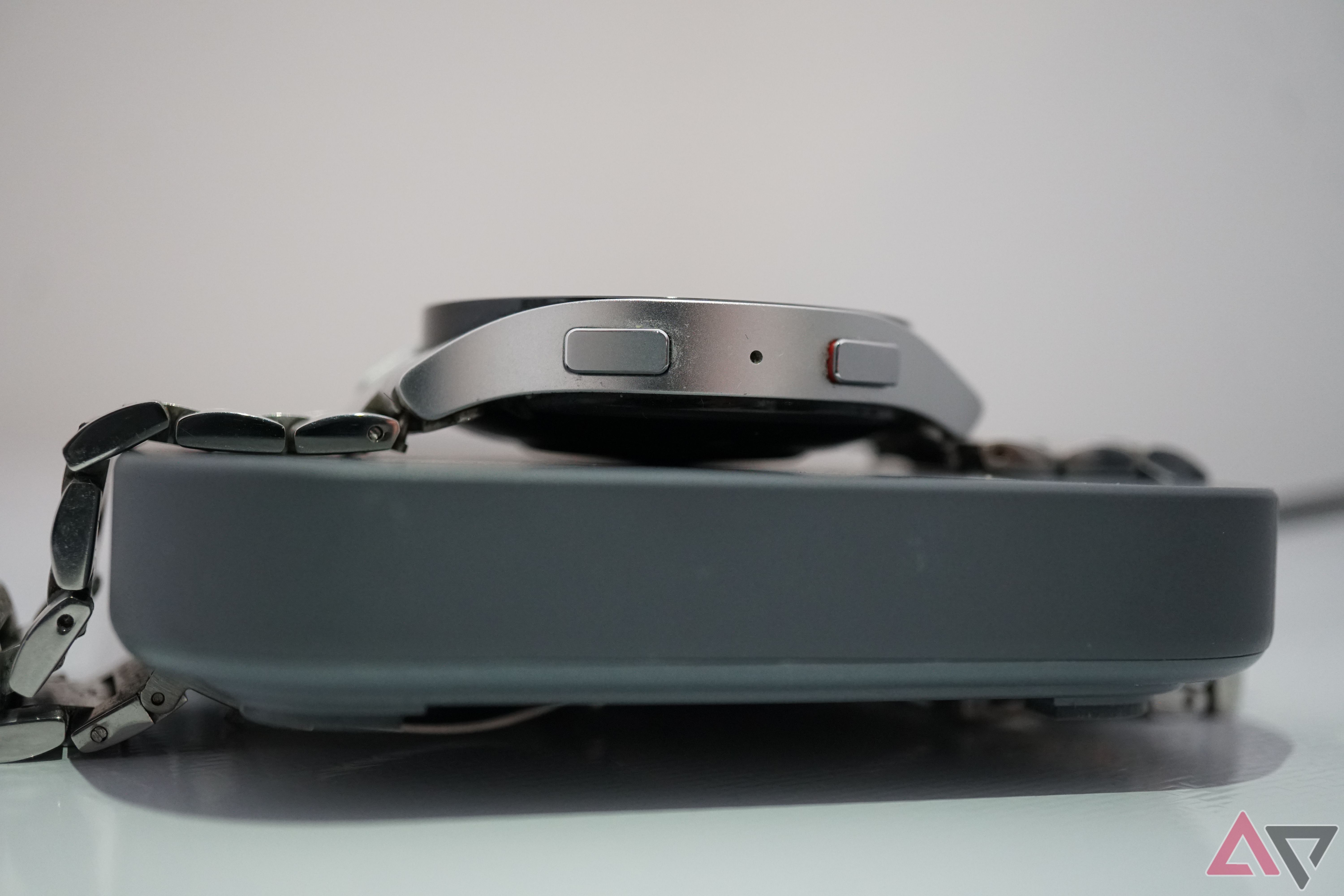 A close-up of the Samsung Wireless Charger Duo with a Watch 6 on top