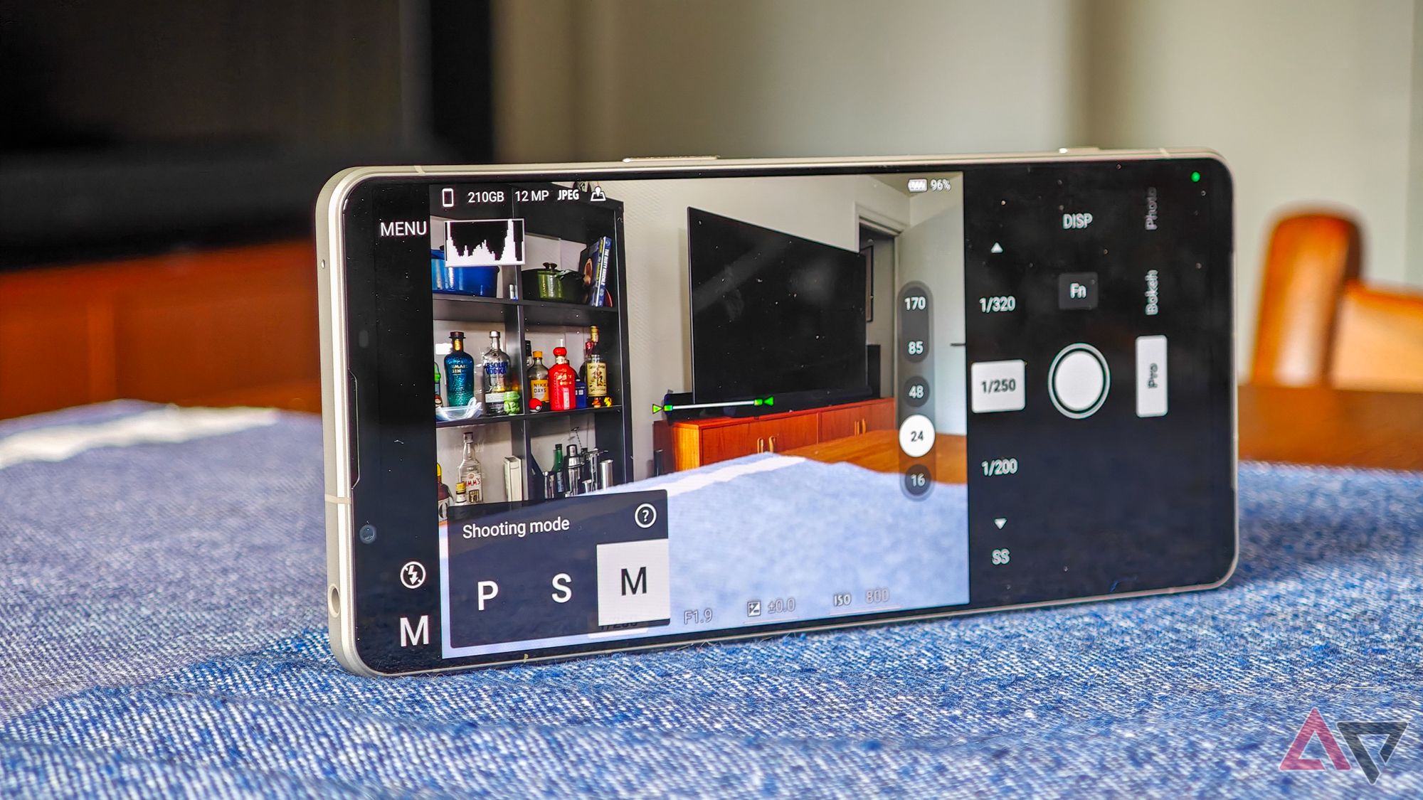 A photo of the Sony Xperia 1 VI resting sideways on a blue tablecloth, showing the Camera app's Pro mode