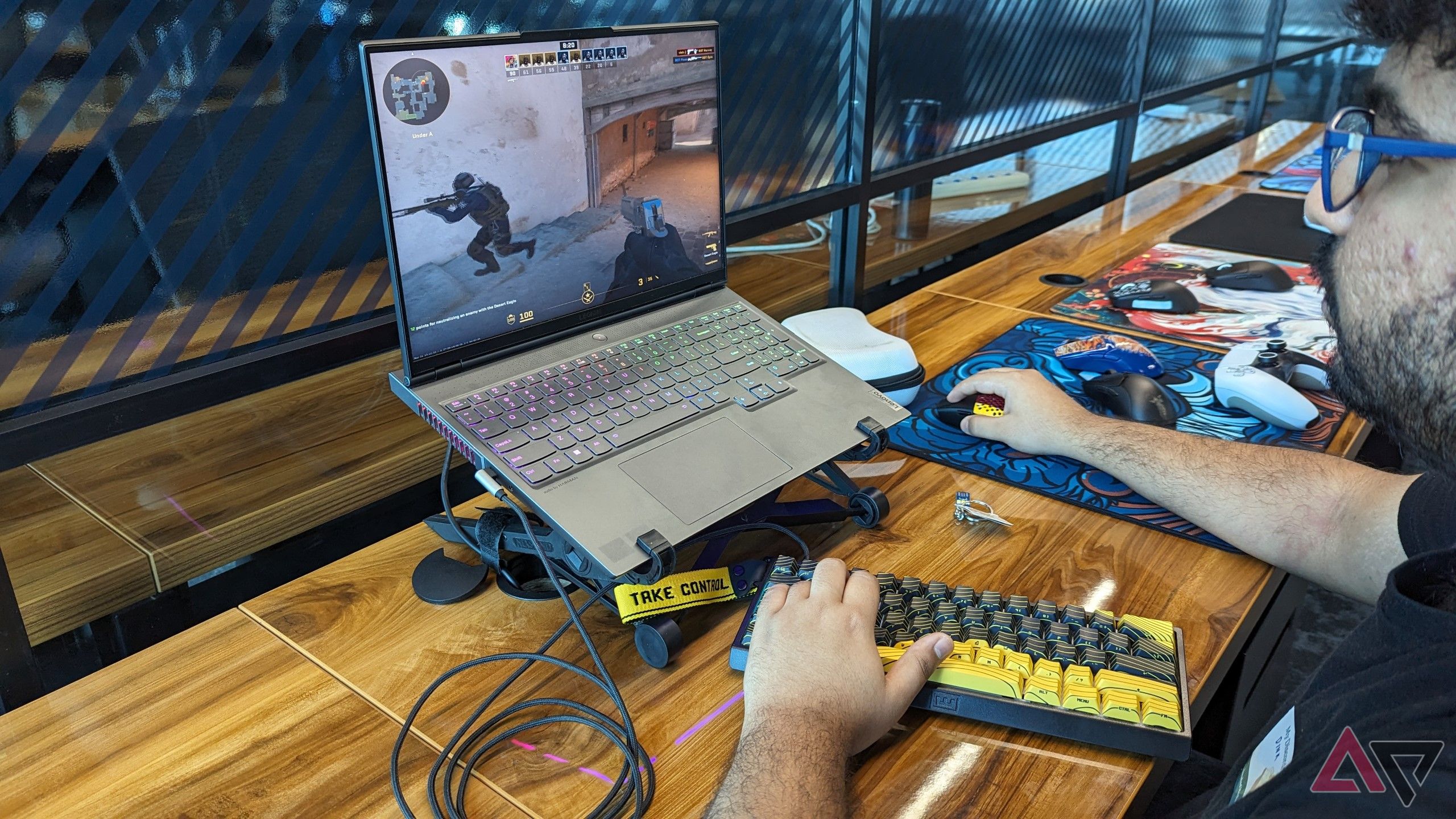 Playing Counter Strike on a laptop with the Wooting 60HE+ connected 