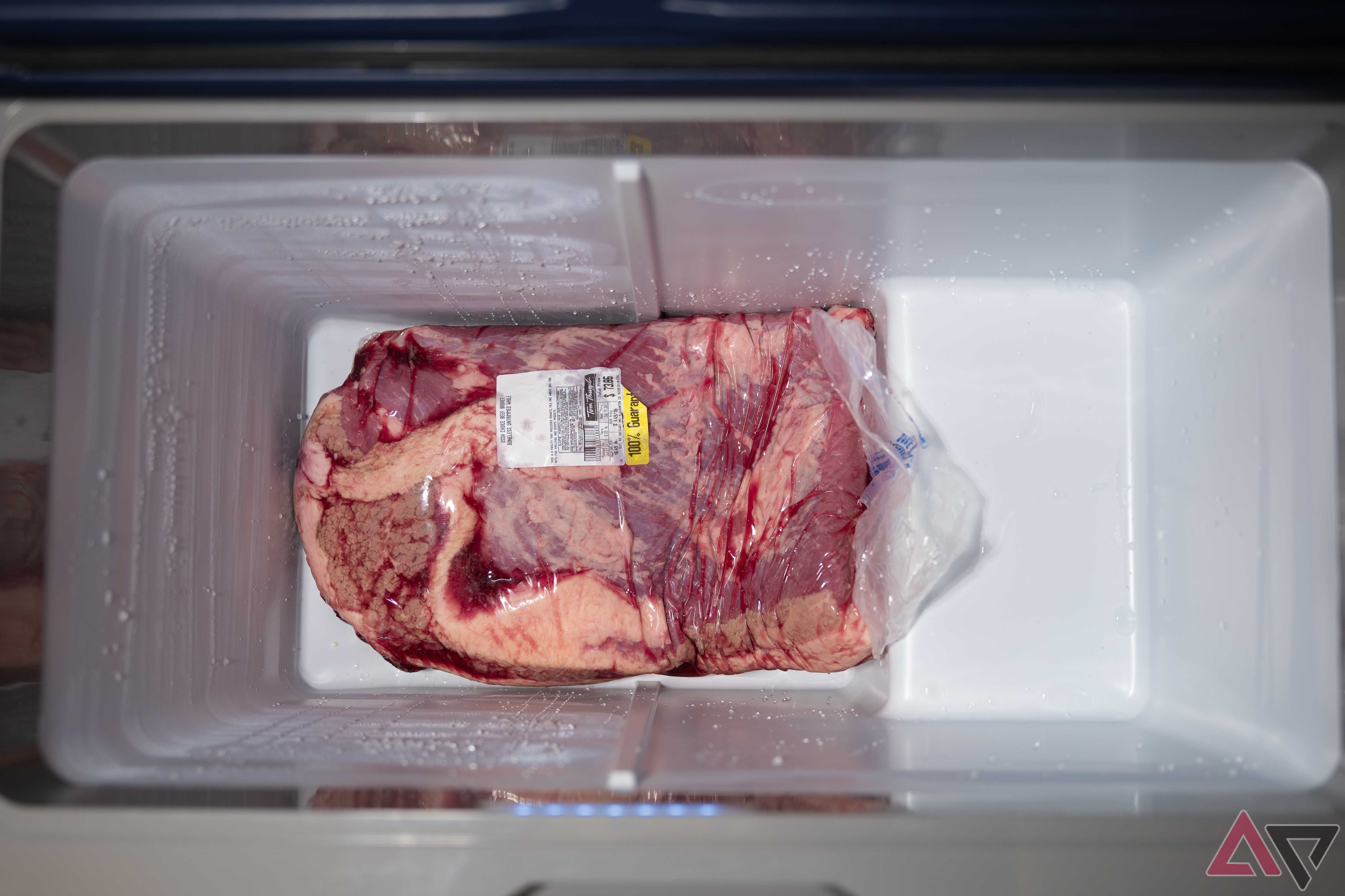 The Bodega Cooler Car Fridge with the center divider removed to make room for a long brisket