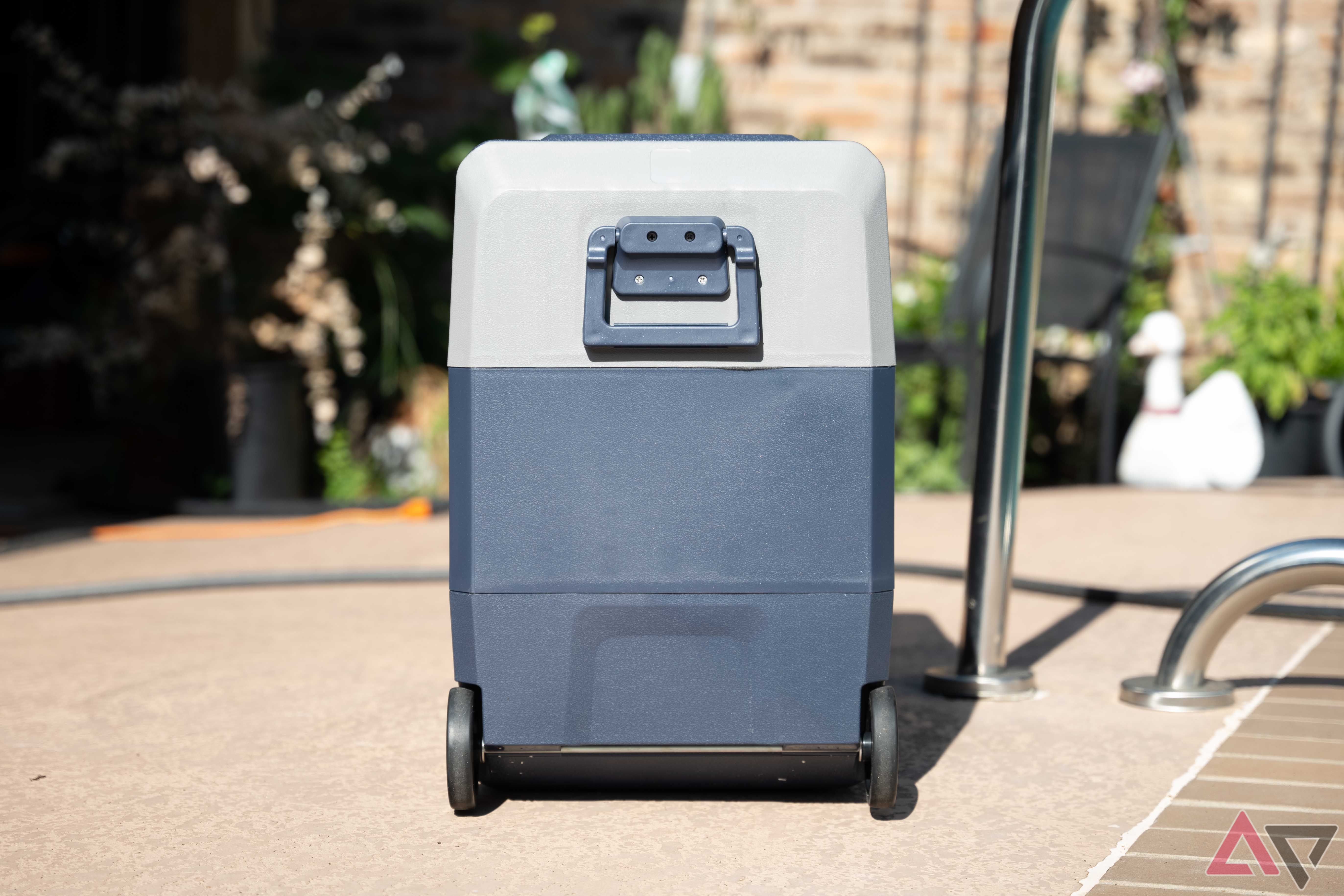 The fridge side of the Bodega Cooler Car Fridge, with the smaller handle and its wheels visible.