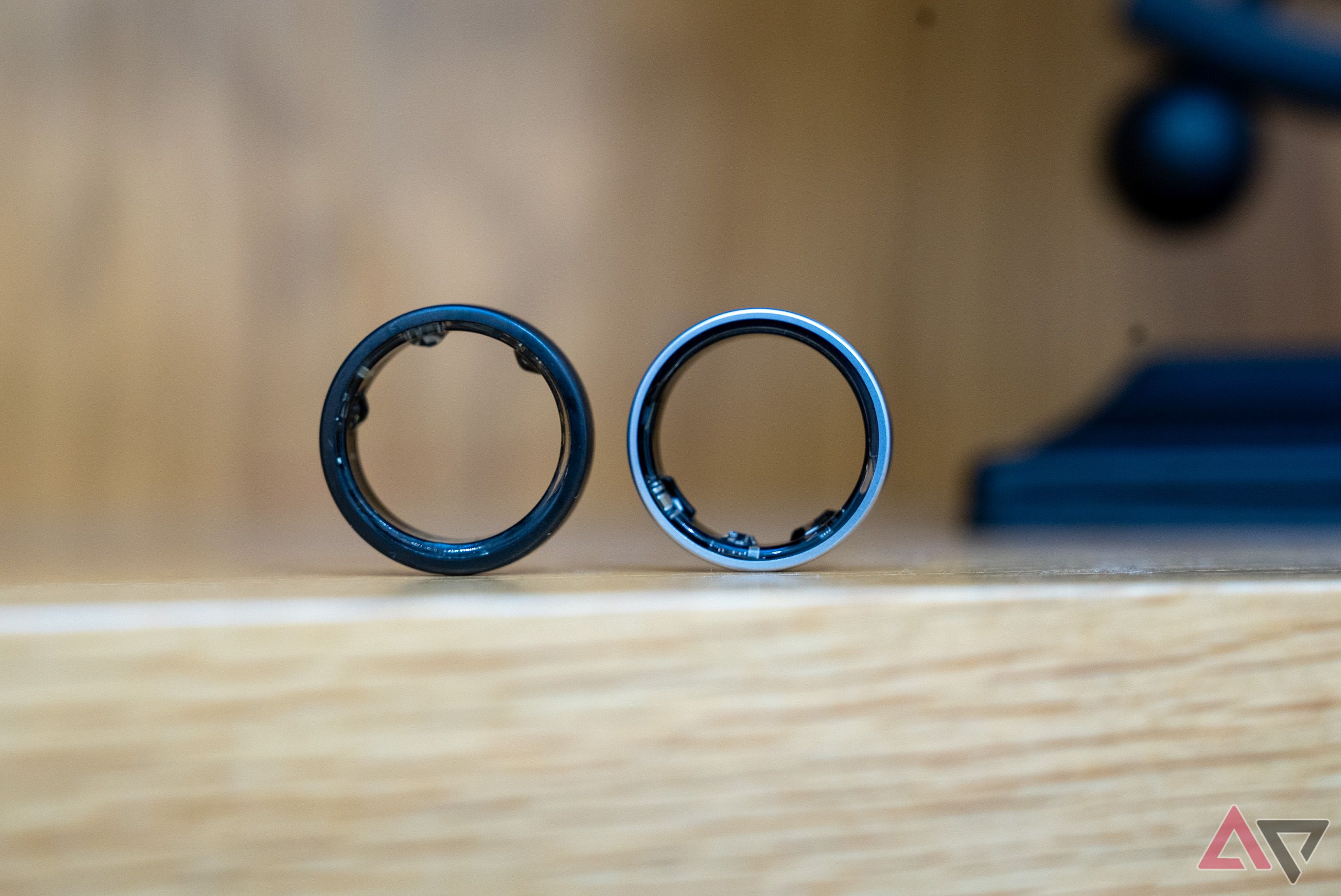 Profile shot of the Galaxy Ring next to the Oura Ring