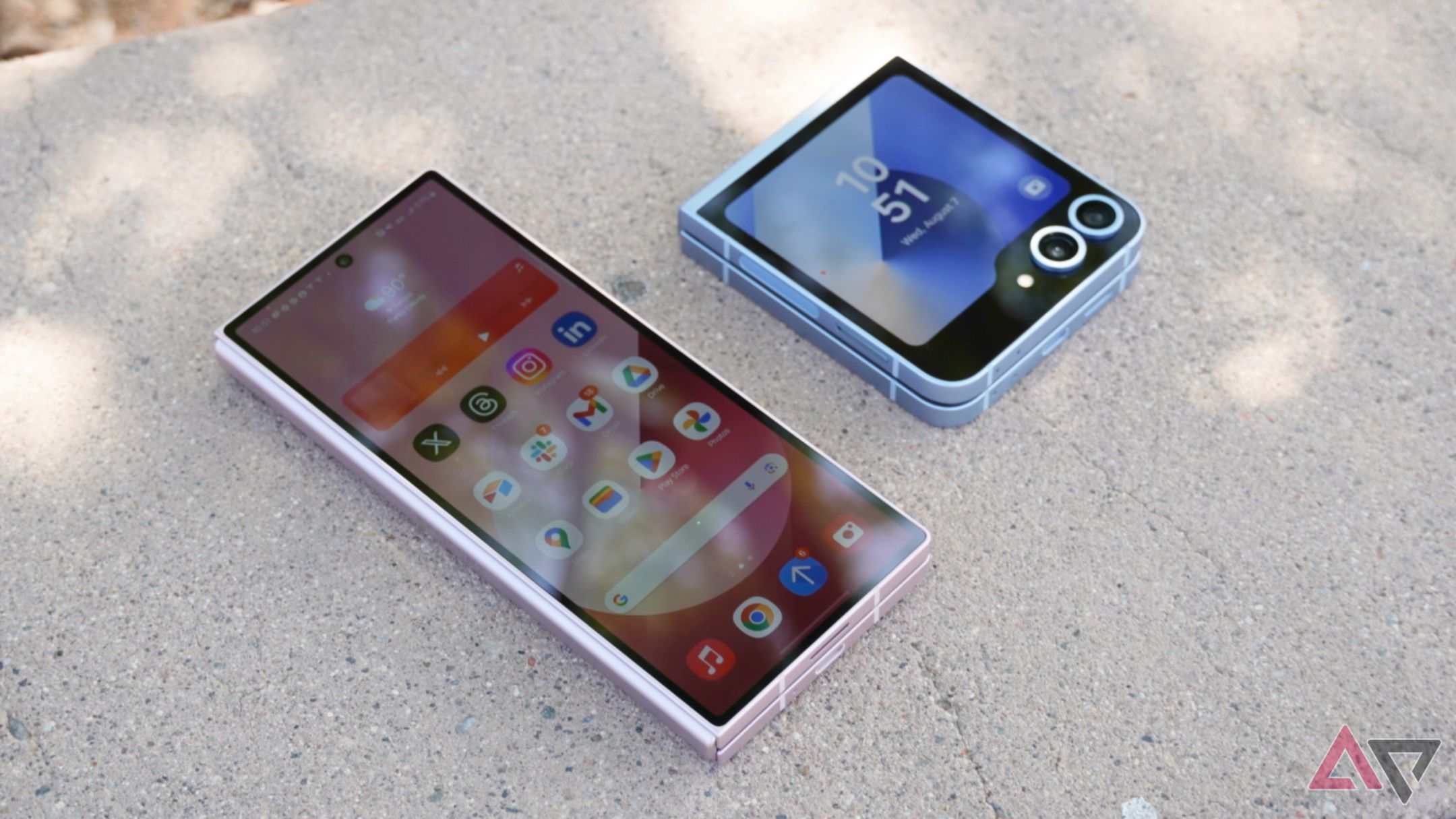 The Samsung Galaxy Z Fold 6 and Galaxy Z Flip 6 outdoors with the display on.