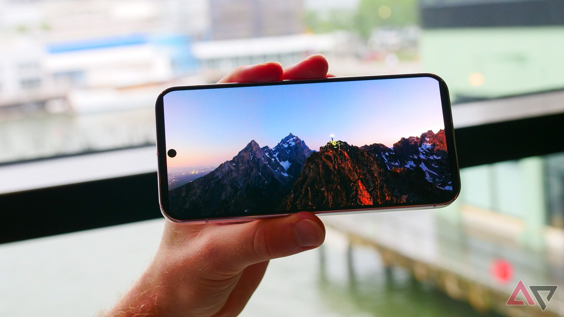 Google Pixel 9 held in hand with panorama demo