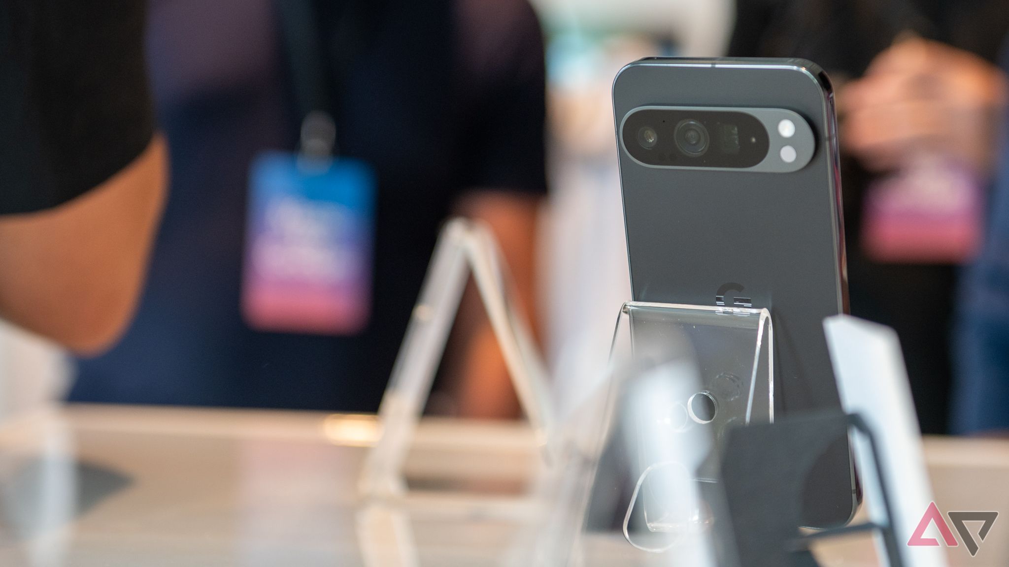 Google Pixel 9 Pro in grey standing on a desk