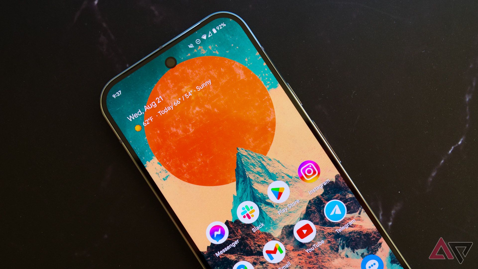 A closeup on the Pixel 9 Pro's home screen on a black background