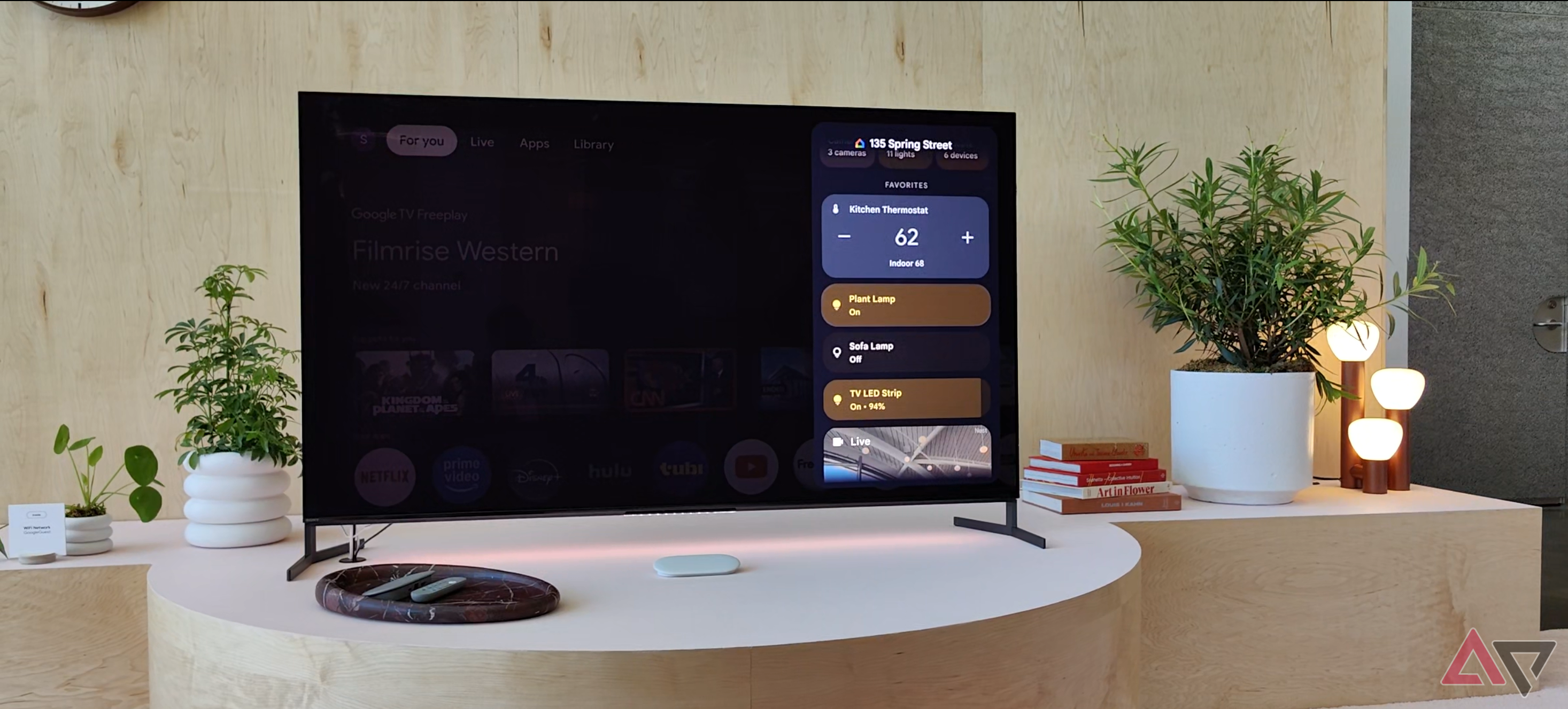 A Google TV showing the Home panel