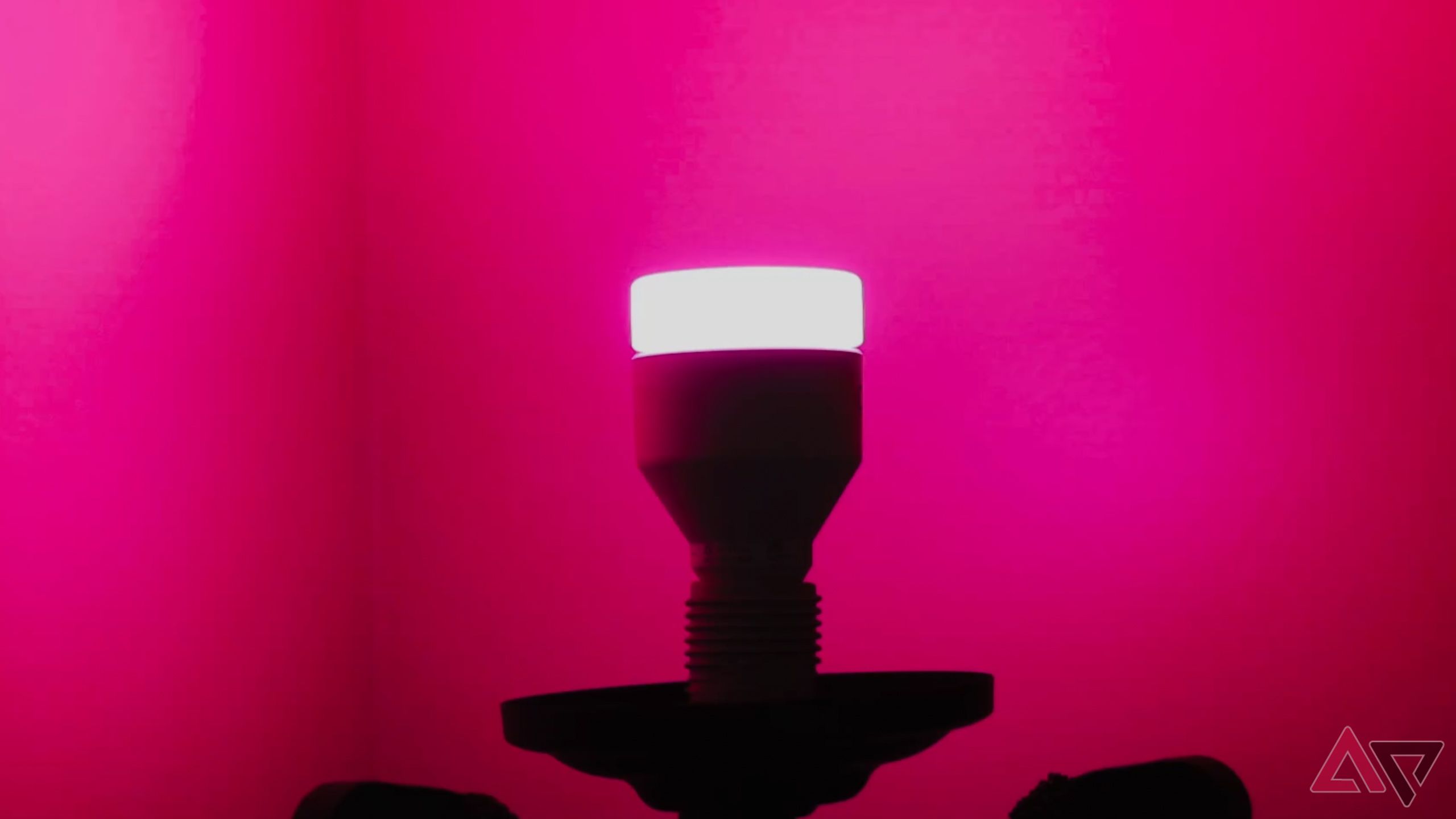 LIFX A21 SuperColor Smart Bulb with bright pink color