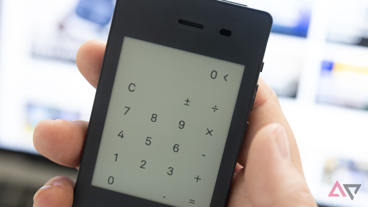 Light Phone II being held and showing the calculator