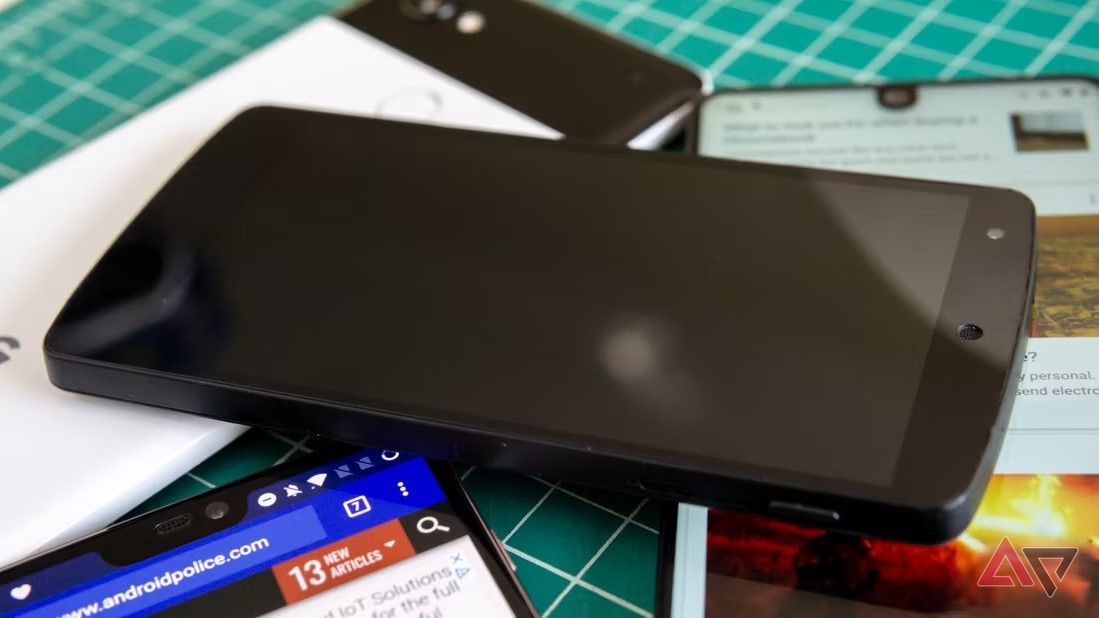 Nexus 5on pile of phones with screen off